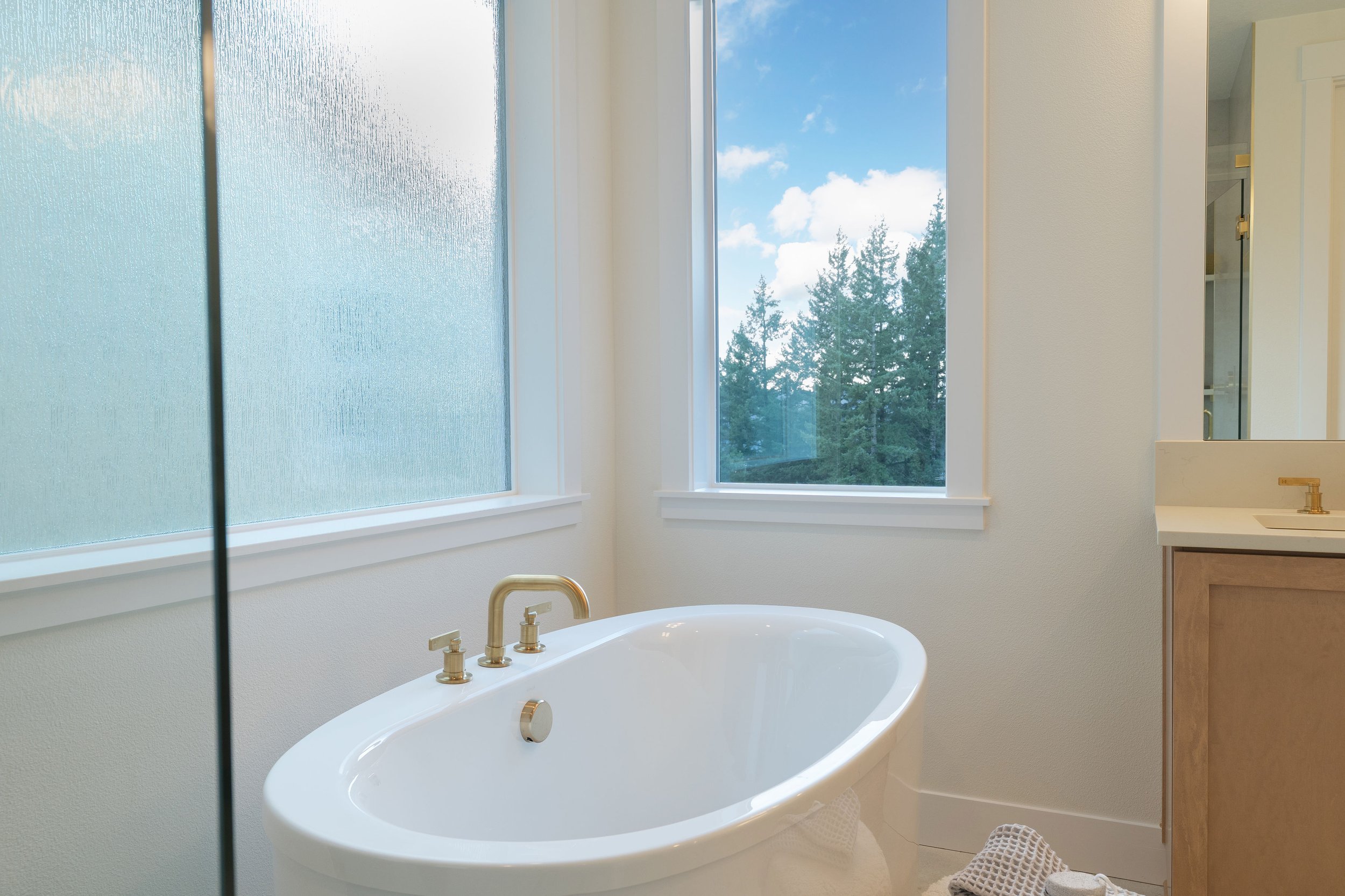 New construction luxury home in West Linn, Oregon, crafted by The Portlock Company — the Portland area’s trusted local home builder. 