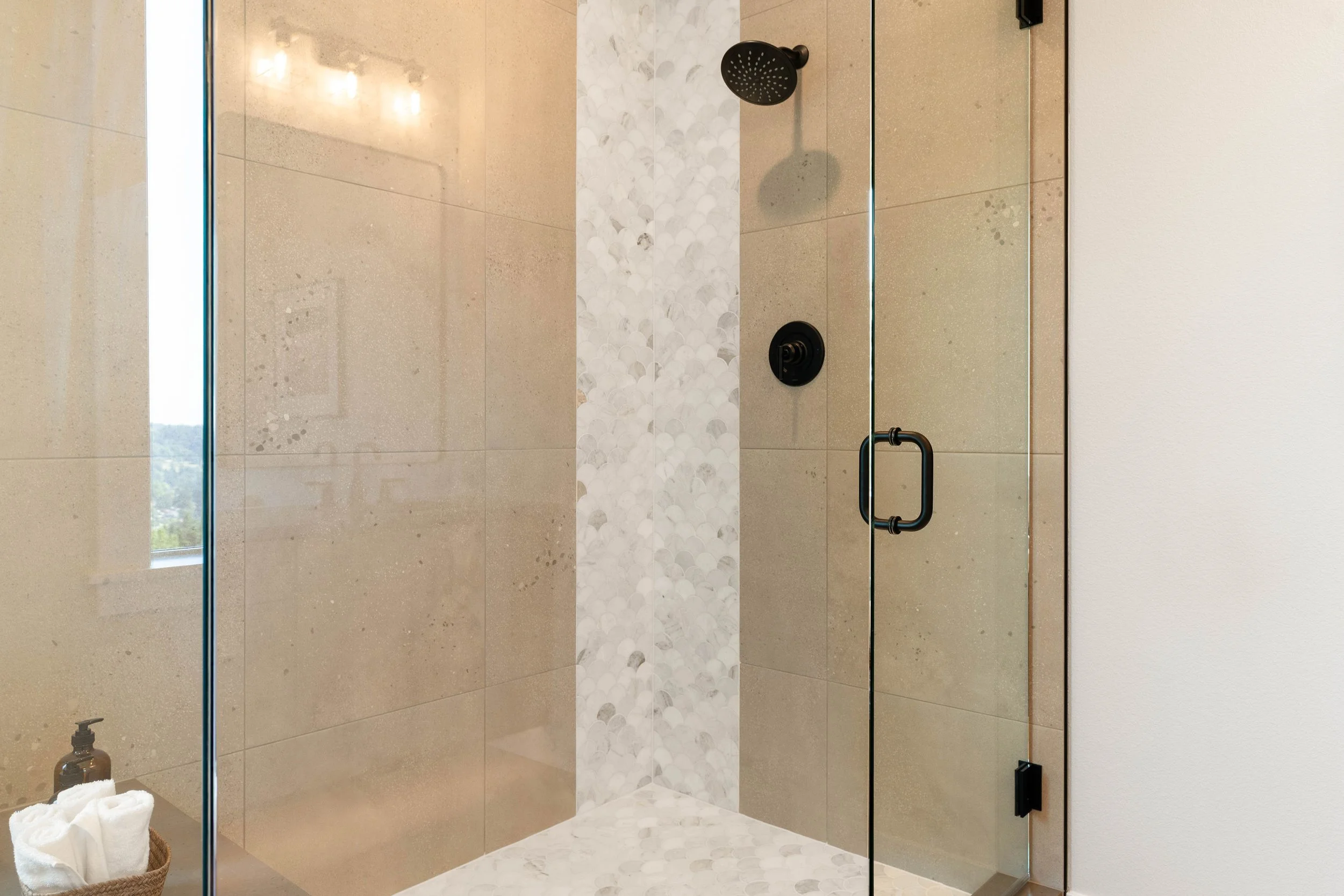 New construction luxury home primary ensuite bathroom in West Linn, Oregon by The Portlock Company
