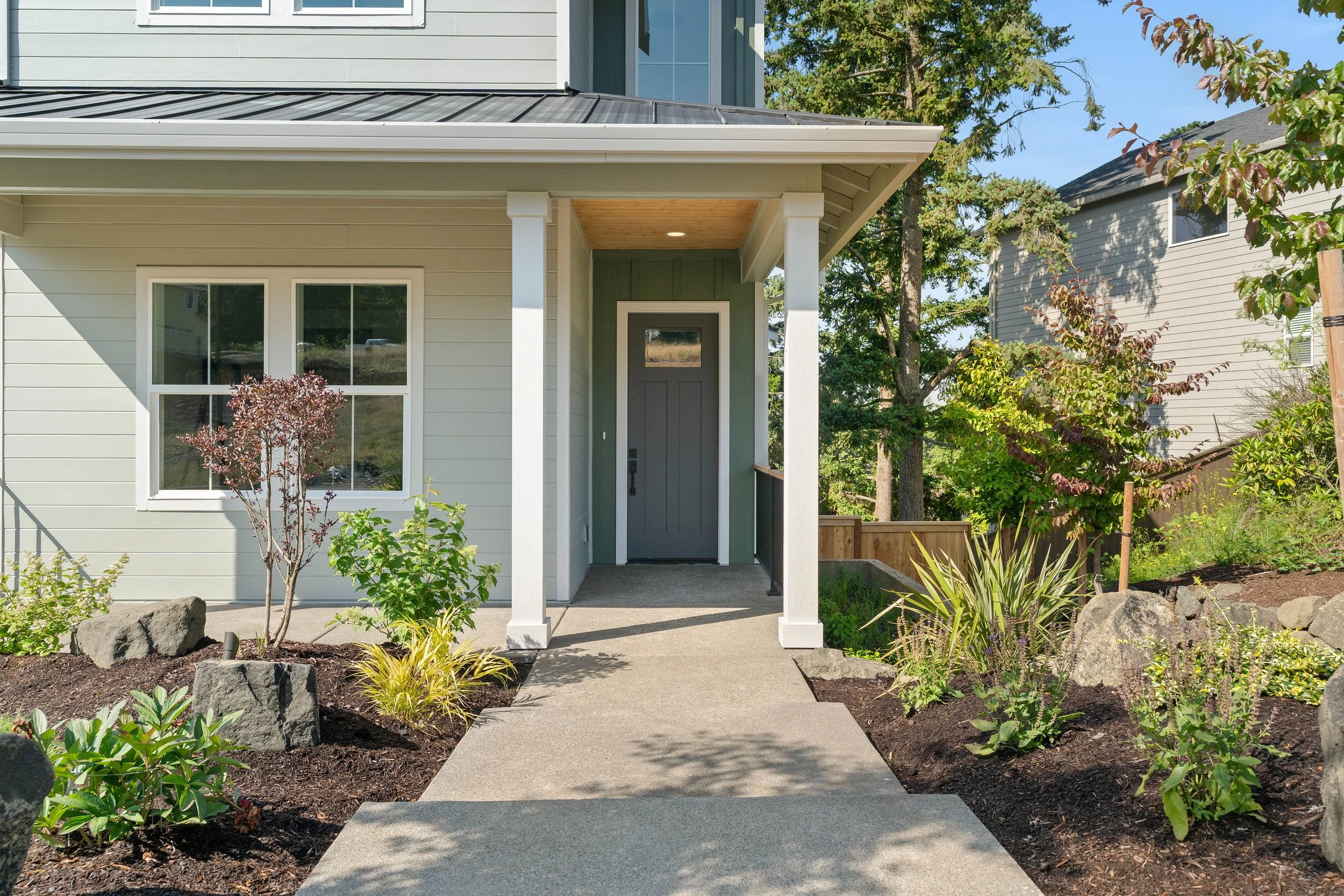New luxury home in West Linn, Oregon, crafted by The Portlock Company — the Portland metro area’s trusted local home builder.