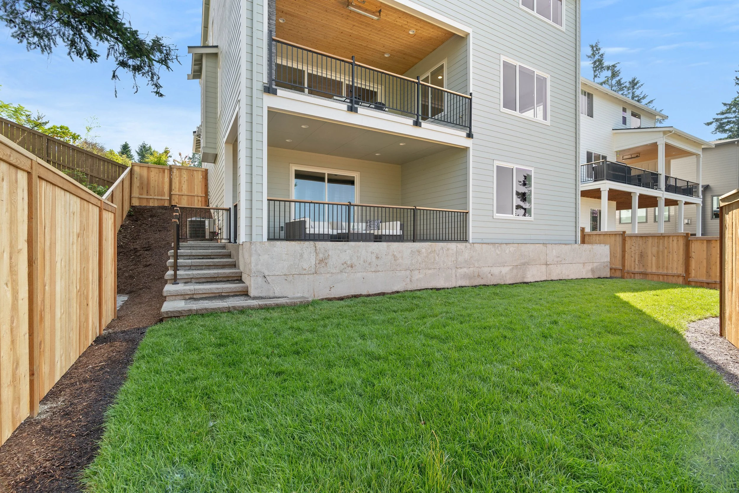 New luxury home in West Linn, Oregon, crafted by The Portlock Company — the Portland metro area’s trusted local home builder.
