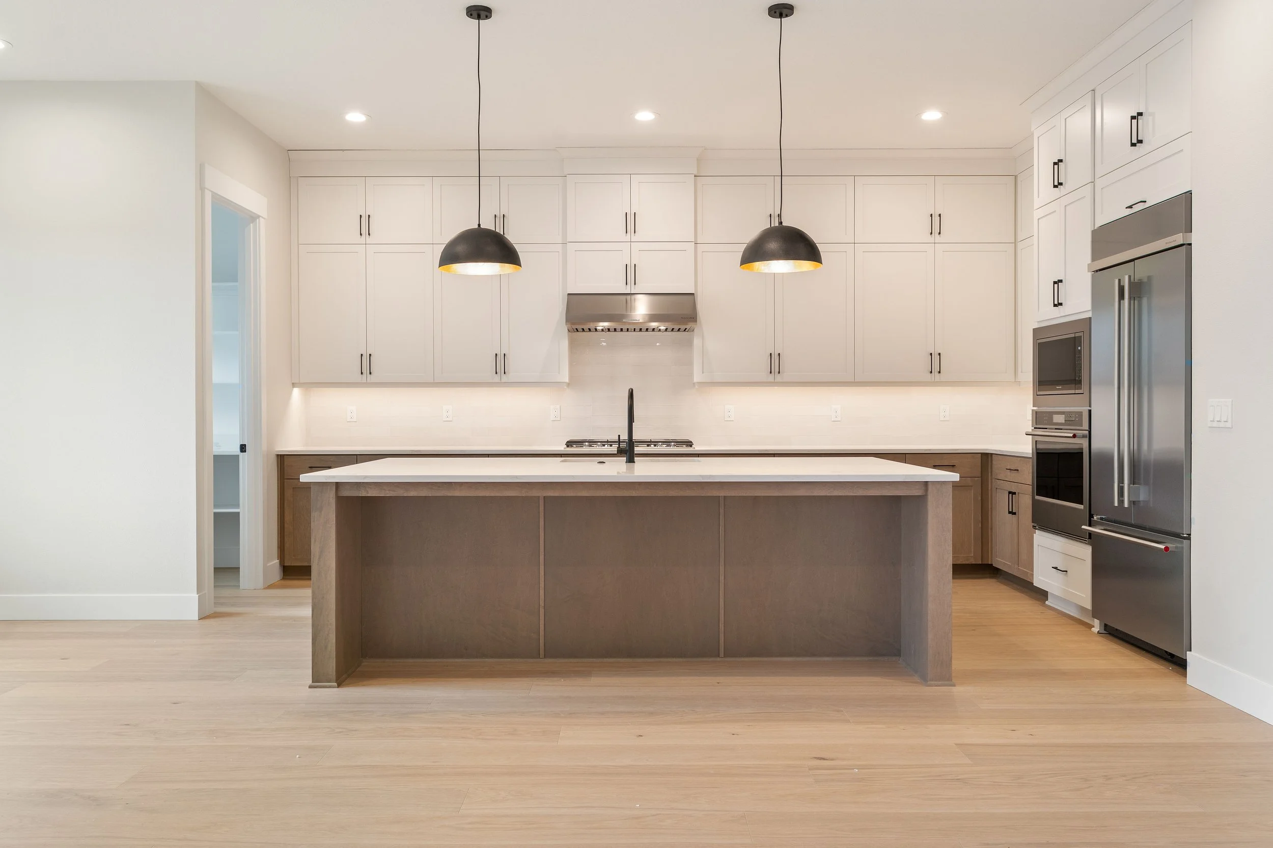 New construction luxury home in West Linn, Oregon, crafted by The Portlock Company — the Portland area’s trusted local home builder. 