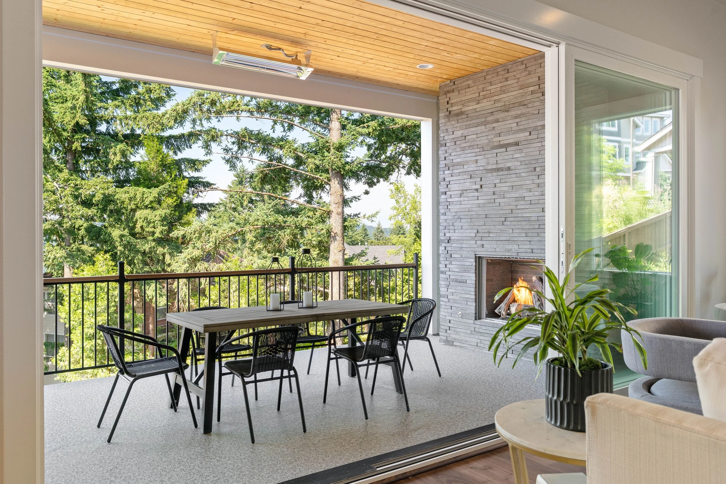 New construction luxury home outdoor patio with fireplace in West Linn, Oregon by The Portlock Company