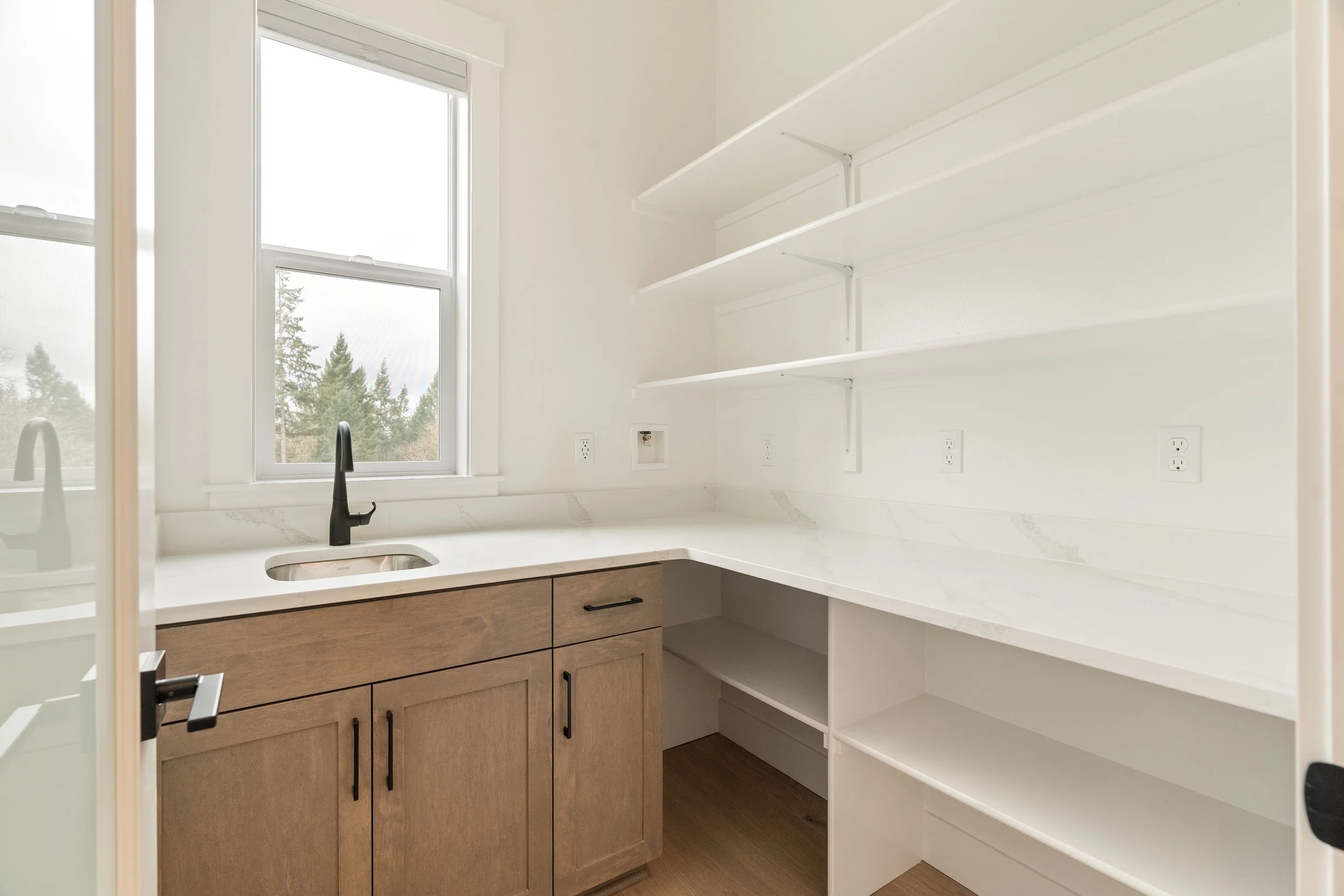 New construction luxury home in West Linn, Oregon, crafted by The Portlock Company — the Portland area’s trusted local home builder. 