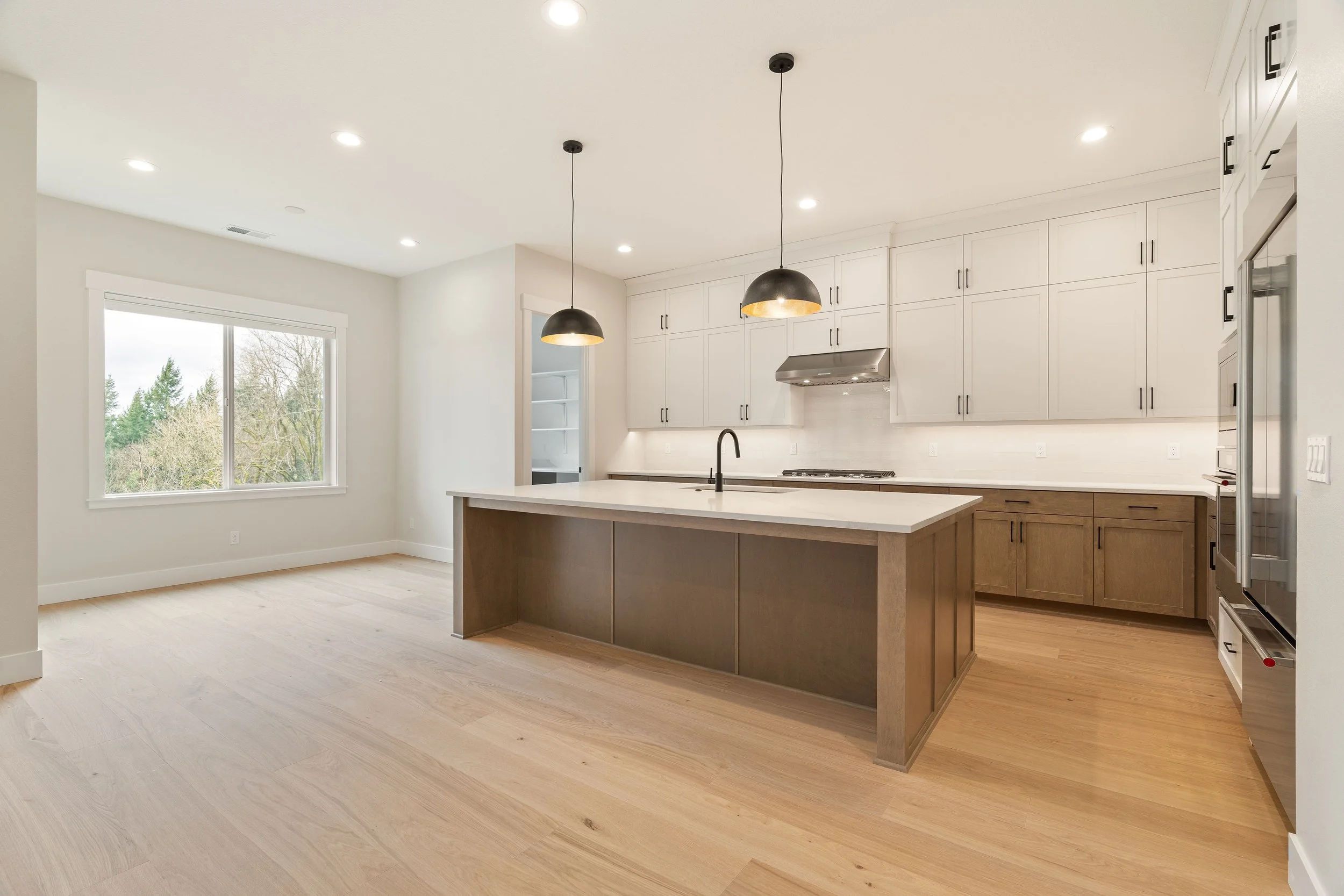 New construction luxury home in West Linn, Oregon, crafted by The Portlock Company — the Portland area’s trusted local home builder. 