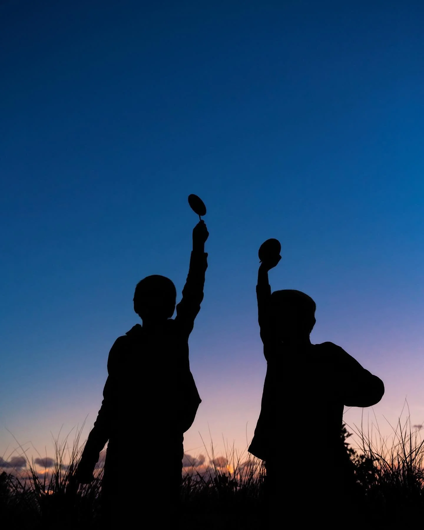 Giant lollipops at blue hour? Absolutely. 🍭 #silhouette #bluehourphotography #fallfamilysesh