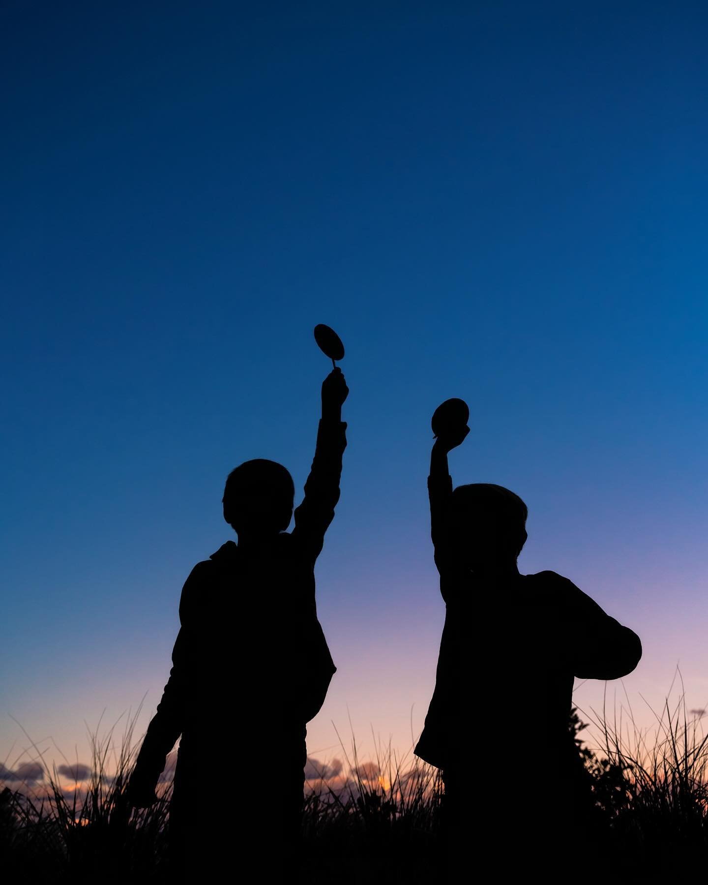 Giant lollipops at blue hour? Absolutely. 🍭 #silhouette #bluehourphotography #fallfamilysesh