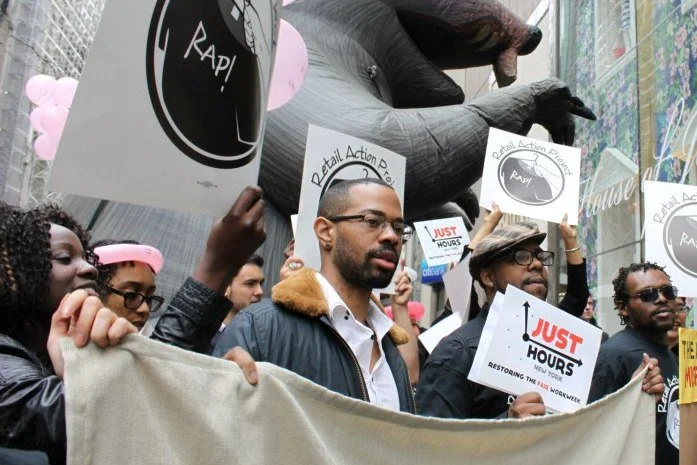 Workers with Just Hours campaign protest underemployment at NRF during Bill Simon speech