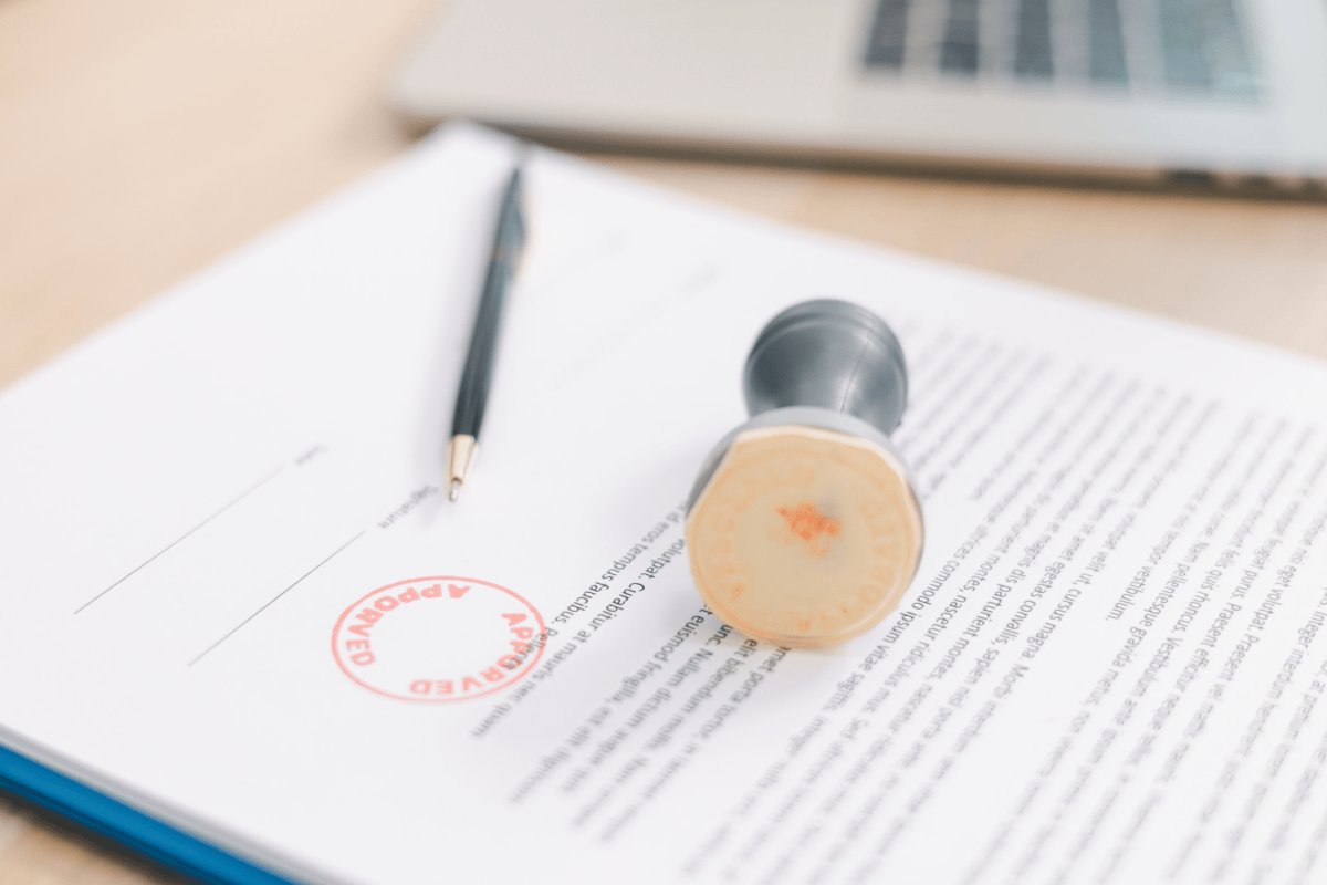 Legal paperwork, representing compliance consulting.