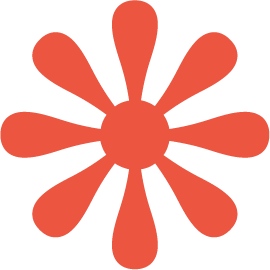 Red abstract flower with a circular center and petal-like shapes radiating outward.