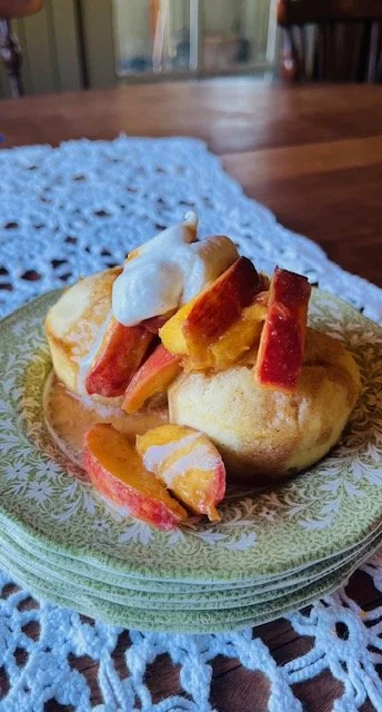 Skillet Bourbon Peaches Over Butter Cakes