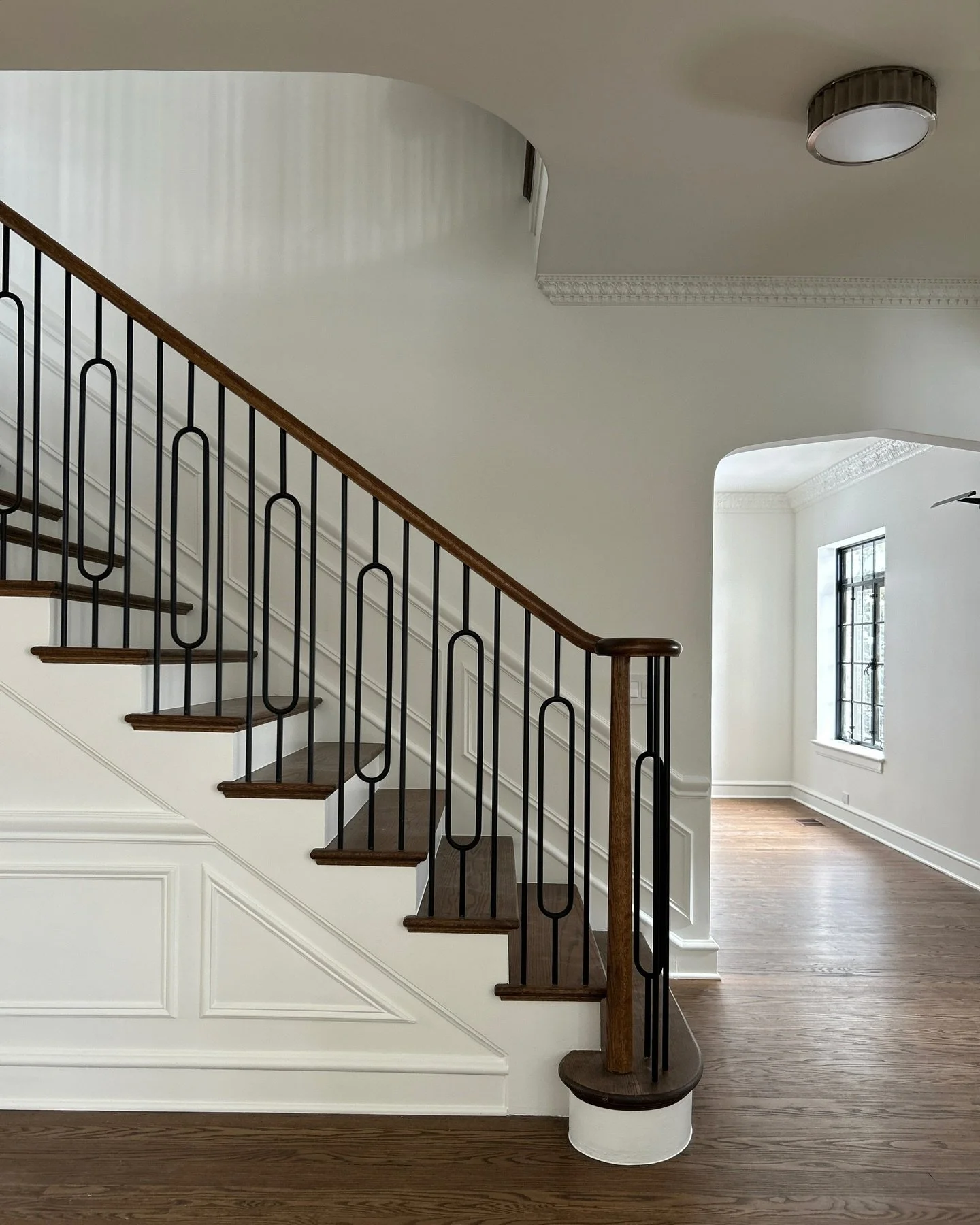 Working on historical homes is a balancing act between preserving original details and bringing a space into a new age.

The bones of this staircase were in great condition, but our priority was making sure it was safe and up to code before the young