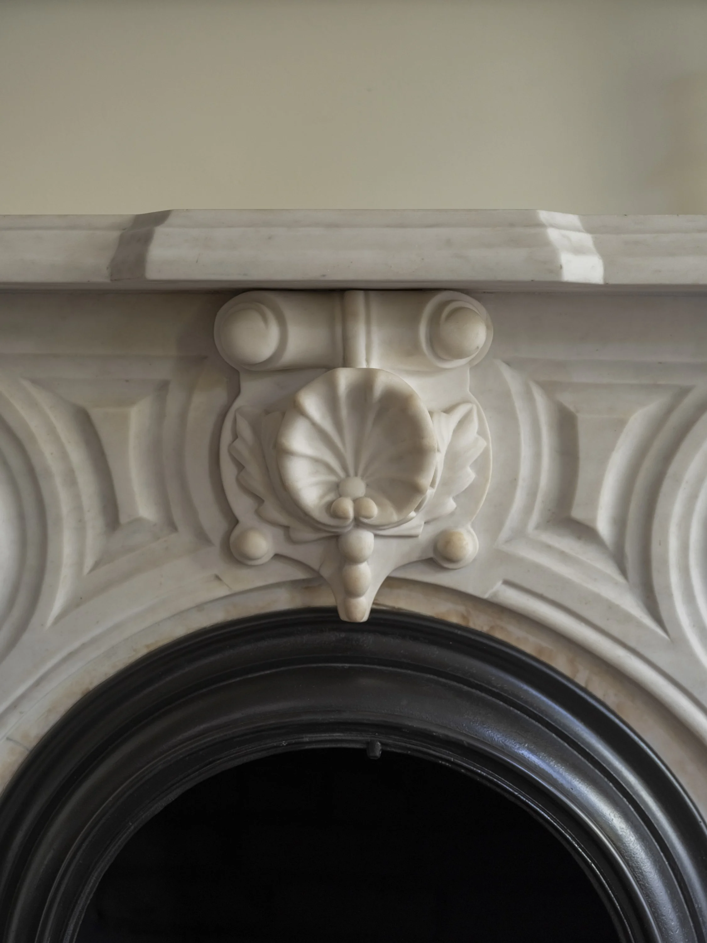 Stone fireplace details original to the home were restored.