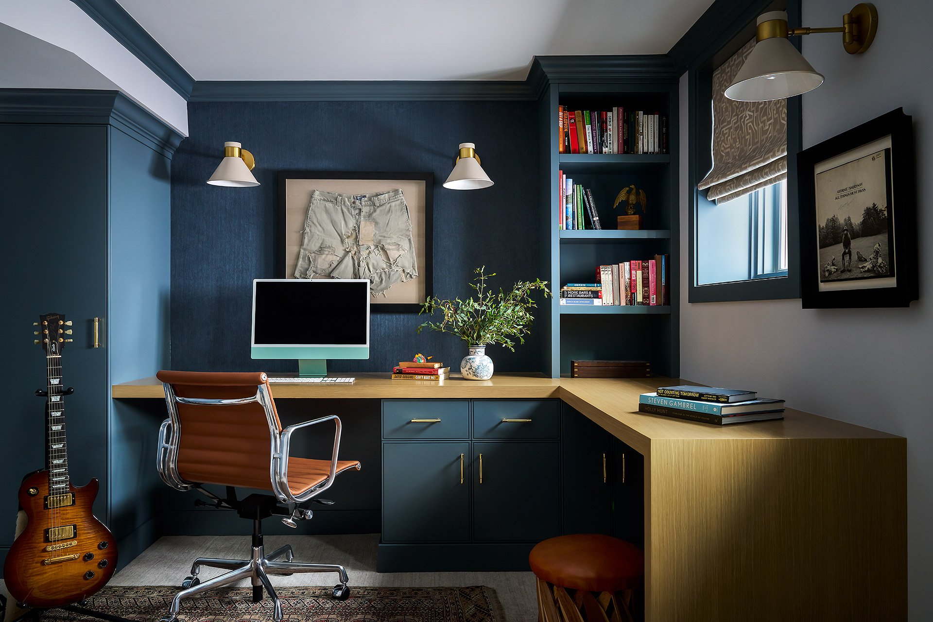 Custom home office with blue cabinetry