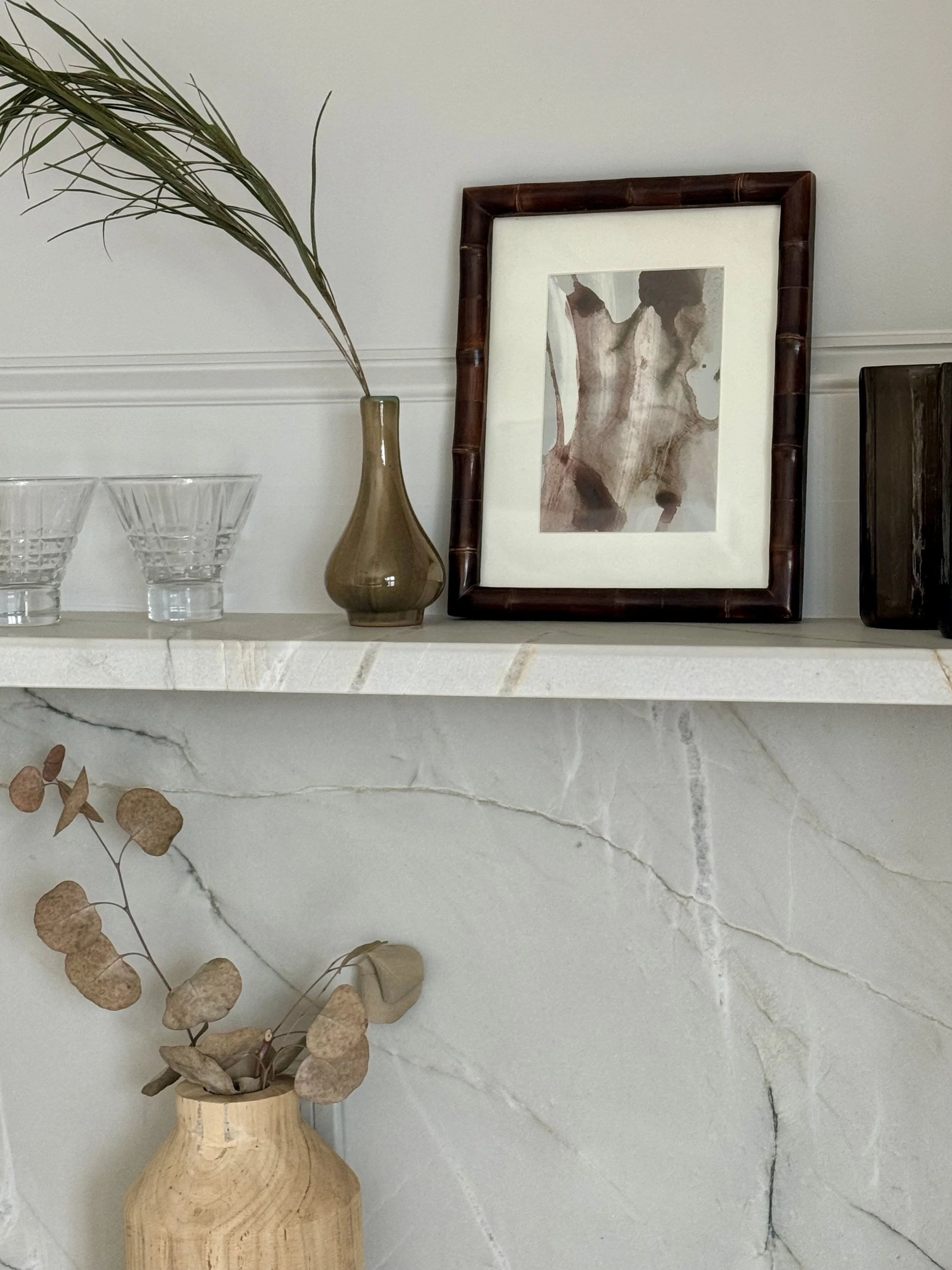 An intimate abstract study styled on stone shelf. 