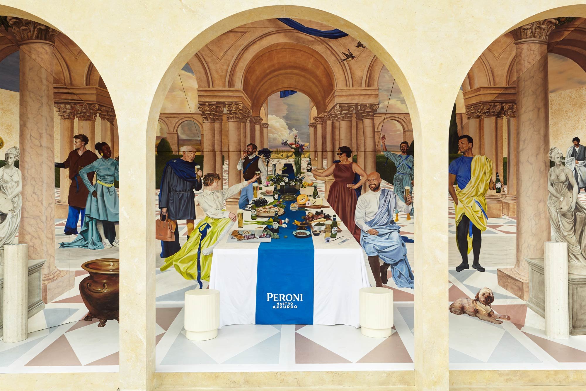 Hand-painted Renaissance-inspired mural created by JOY! Collective for Peroni Nastro Azzurro in Covent Garden, London.