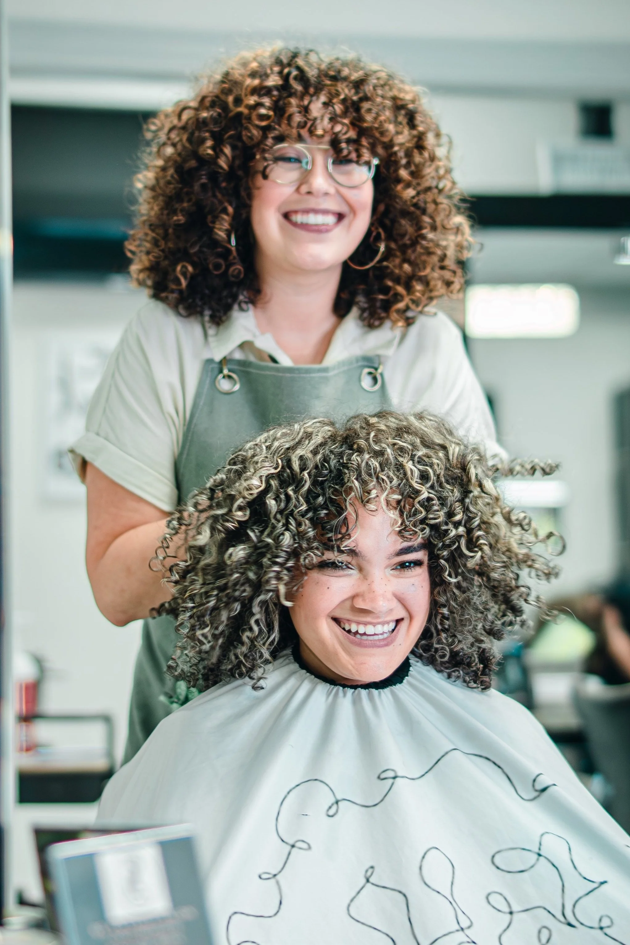 Salon customer with new long natural braids