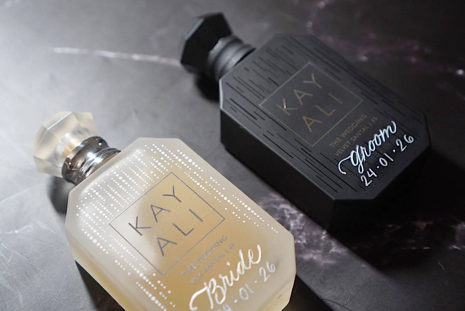 hand-engraved bottles Toronto, custom bottle engraving, wine bottle engraving, personalized liquor bottles, luxury gift engraving, Toronto engraving services, bride and groom perfume bottle