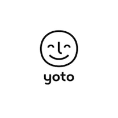 A simple black and white logo featuring a smiling face inside a circle, with the word 'yoto' written underneath.