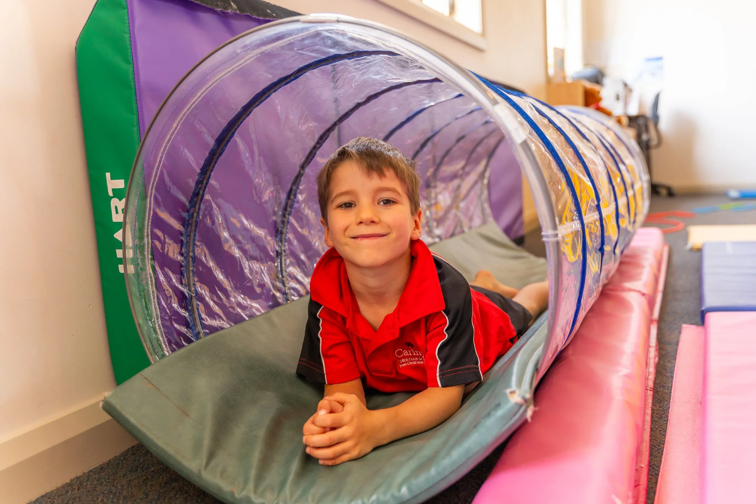 A young boy in the Lilly Pilly Prep Busy Bee Gym at Carinya Christian School, Tamworth