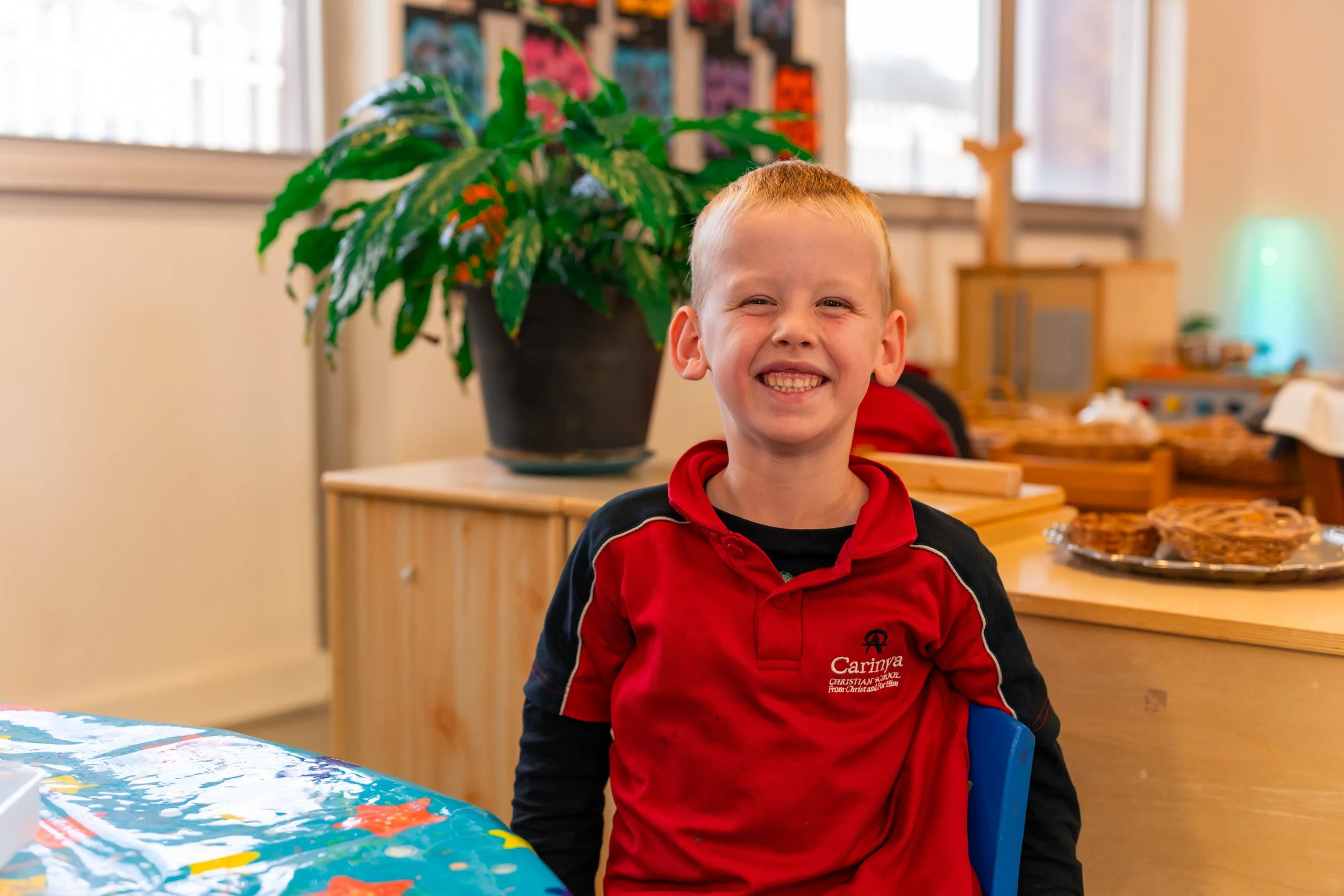 A Prep Student sitting inside the Prep Classroom at Carinya Christian School, Gunnedah's Prep facility.