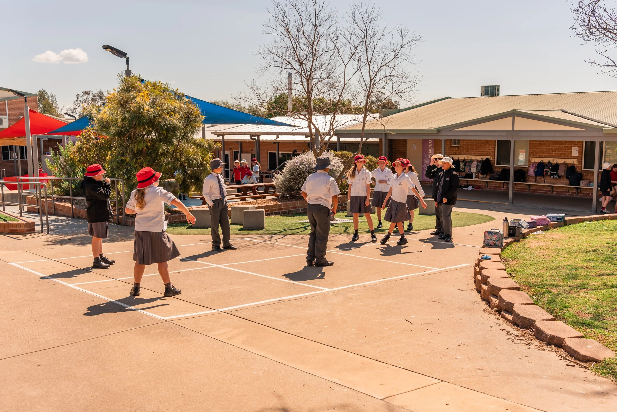 Middle School Students playing handball at Carinya Christian School, Tamworth, in the Middle School playground.