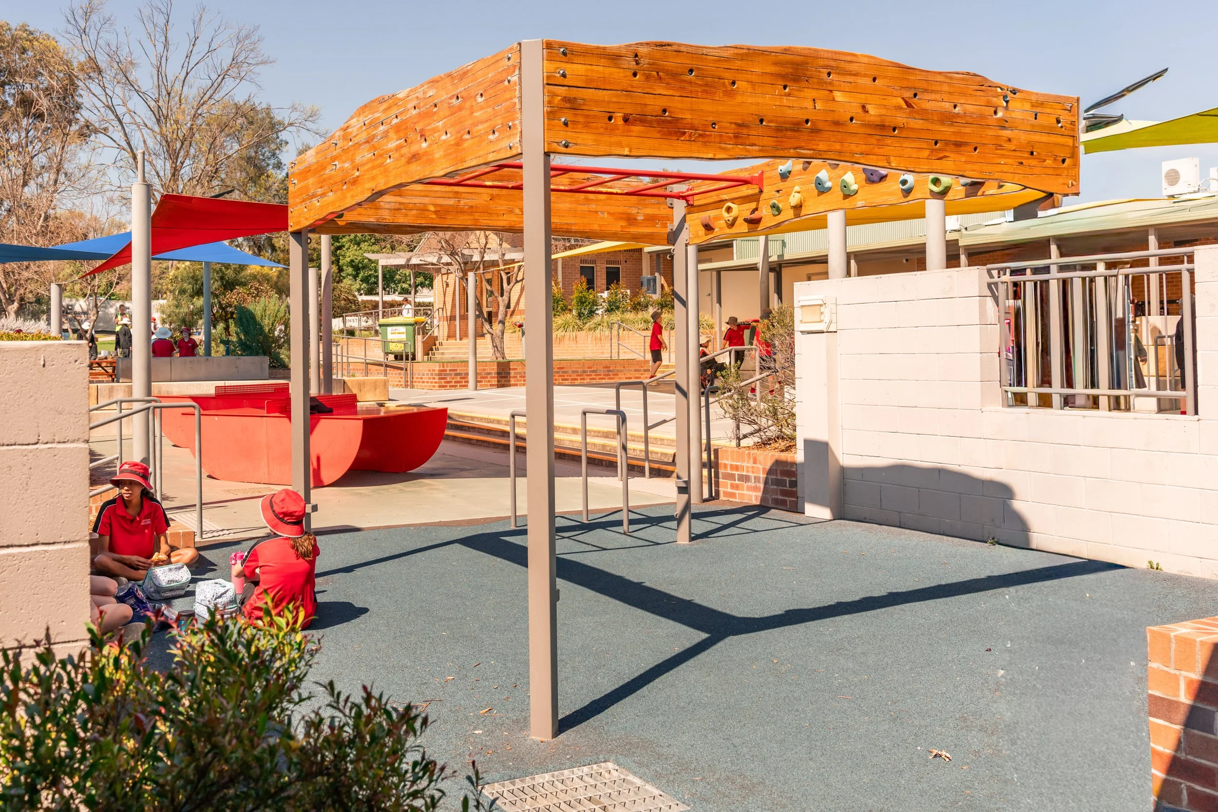 Our Senior and Middle School playground area, with an outdoor climbing wall and Gym at Carinya Christian School, Tamworth