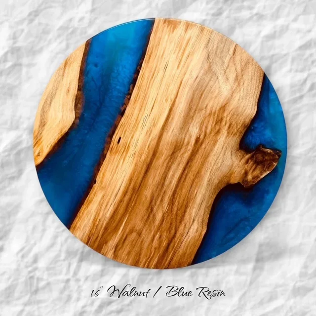 16-inch round walnut Lazy Susan with deep blue resin river, handcrafted by Edgewood Studio