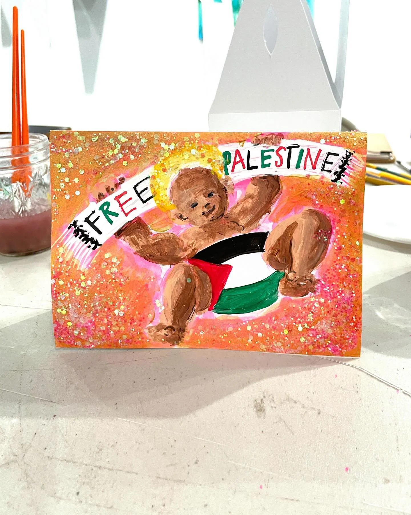 🎄Merry Xmas, World Peace, Free Palestine! 🍉My first and last painting this year - just in time 😅. Ode to the most famous Palestinian. 
🎨 Painted at the Art Bodedga, the most fun place to get your Xmas presents! @twfineart @4cryingartloud 209 E 3r