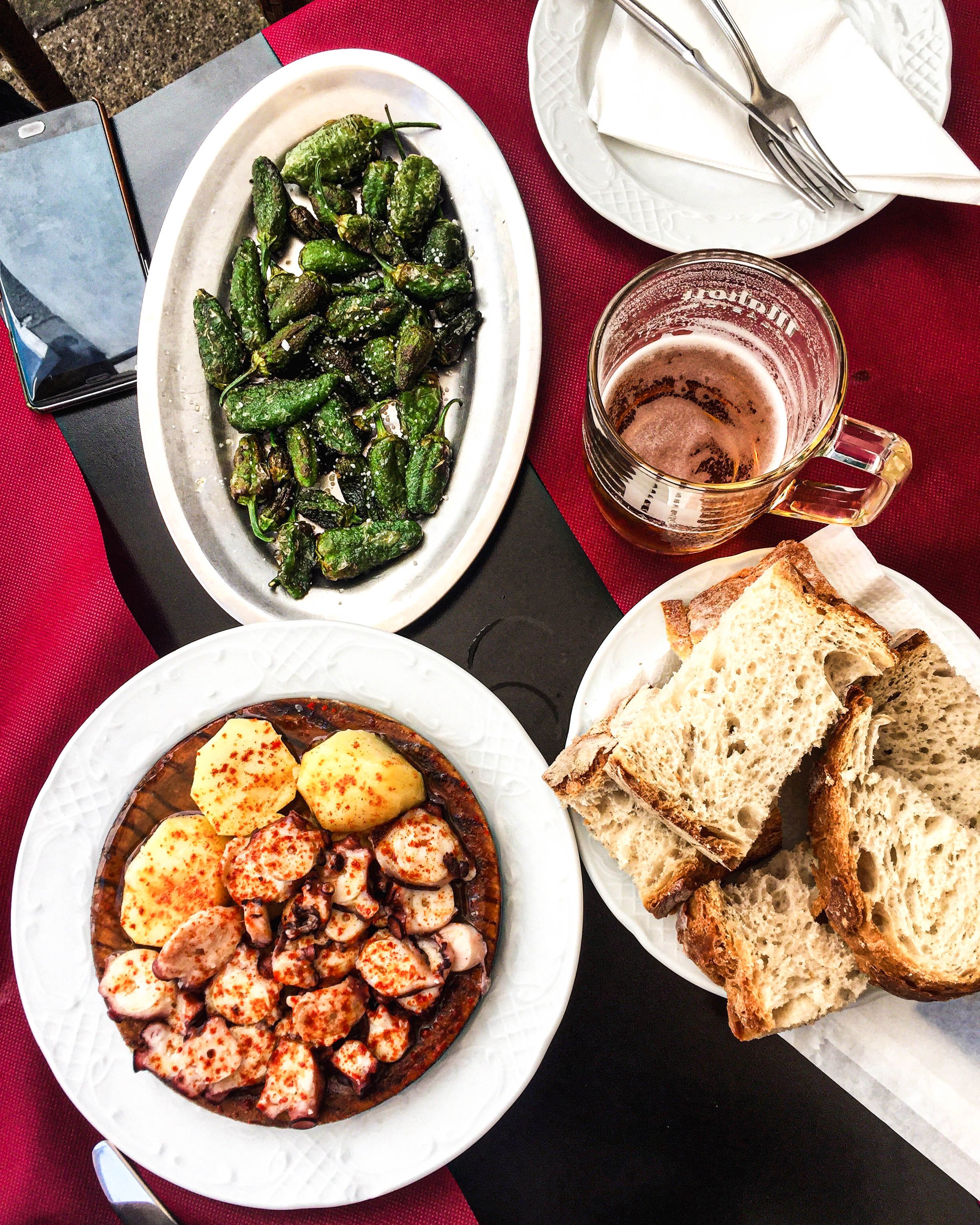 Octopus, fried potatoes, pimientos de padron, eaten somewhere in Spain while walking the Camino de Santiago. I rarely eat octopus because they are highly intelligent and it makes me feel guilty, but when I do, oh how I love it - steak of the sea.