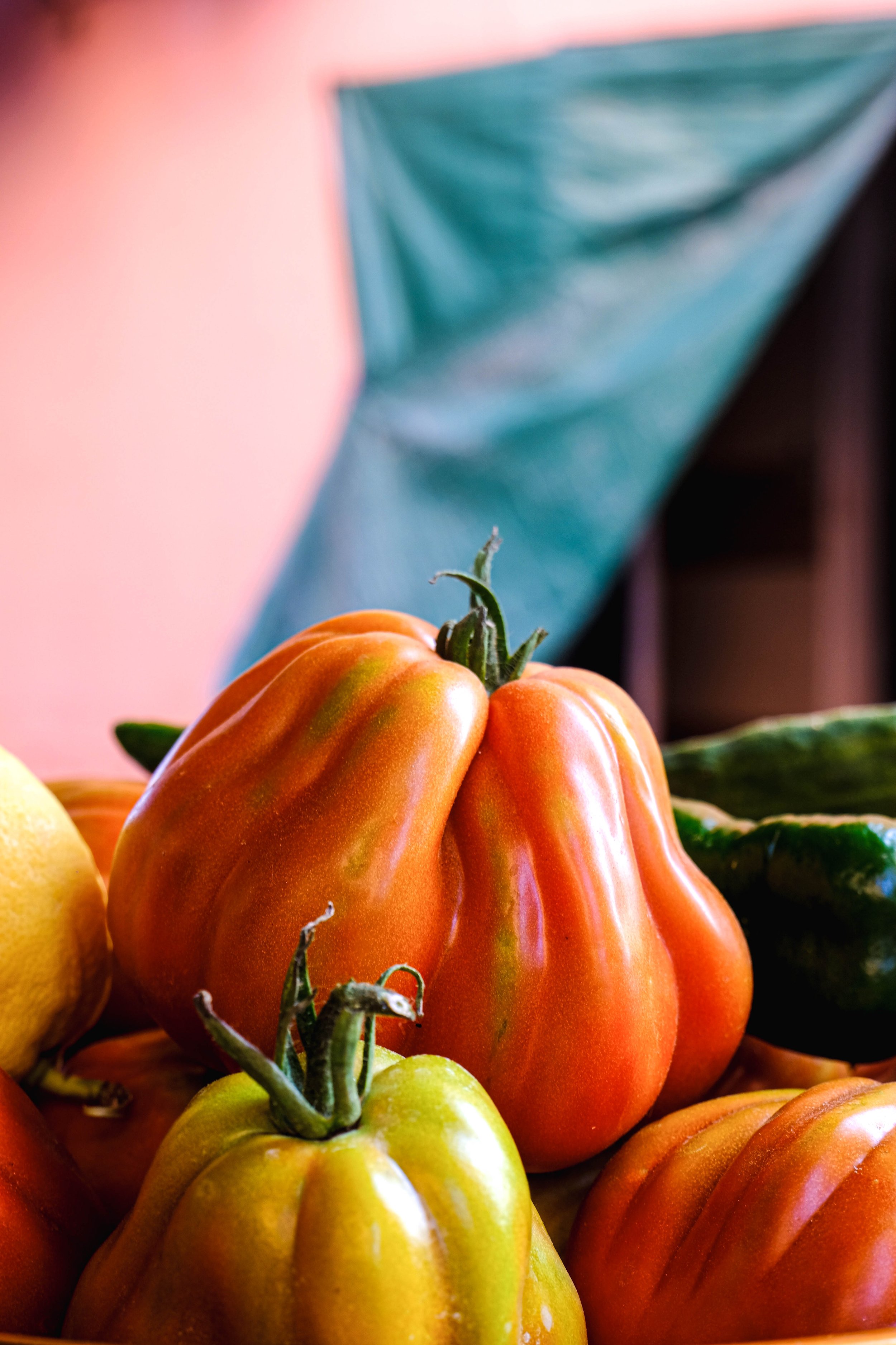 I spent a summer working as a private chef in Grasse, France. On my days off I would often take the train to Ventimiglia, Italy to eat pasta, drink a spritz by the sea and browse the markets full of gorgeous produce like these showstopping tomatoes.