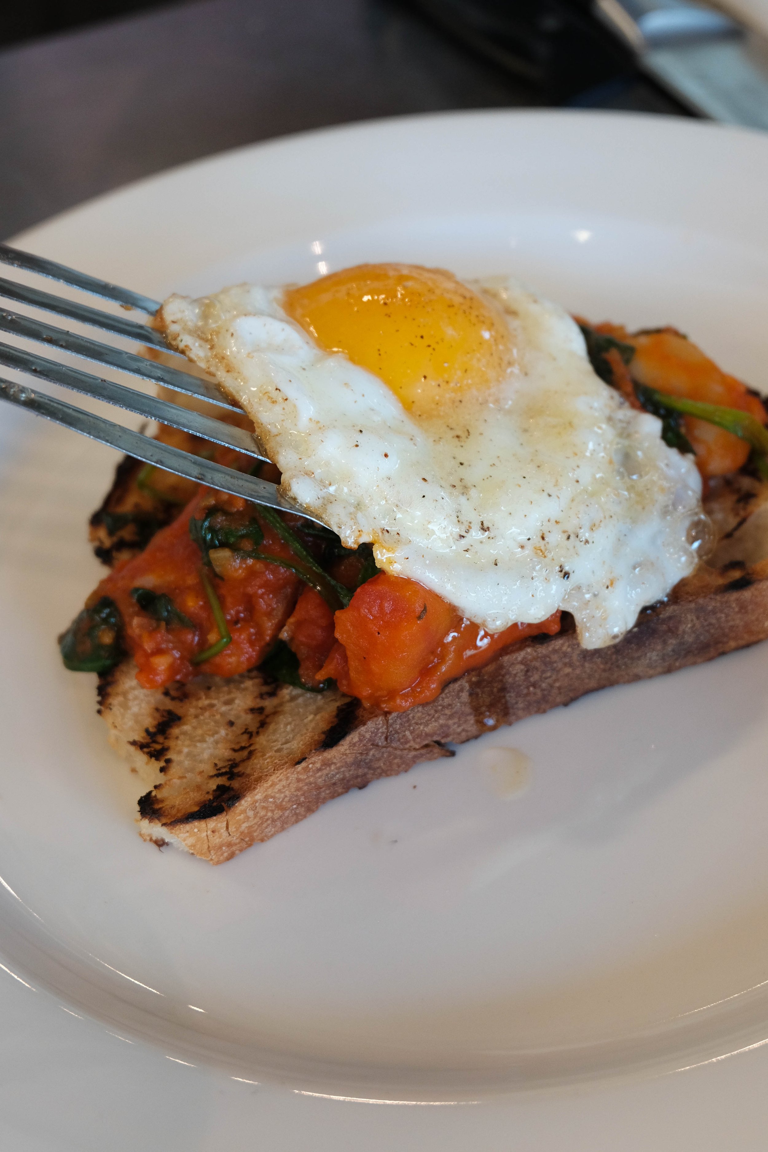 Grilled sourdough, seasonal sauteed vegetables and a fresh egg, shot during my days as a chef at Thyme.