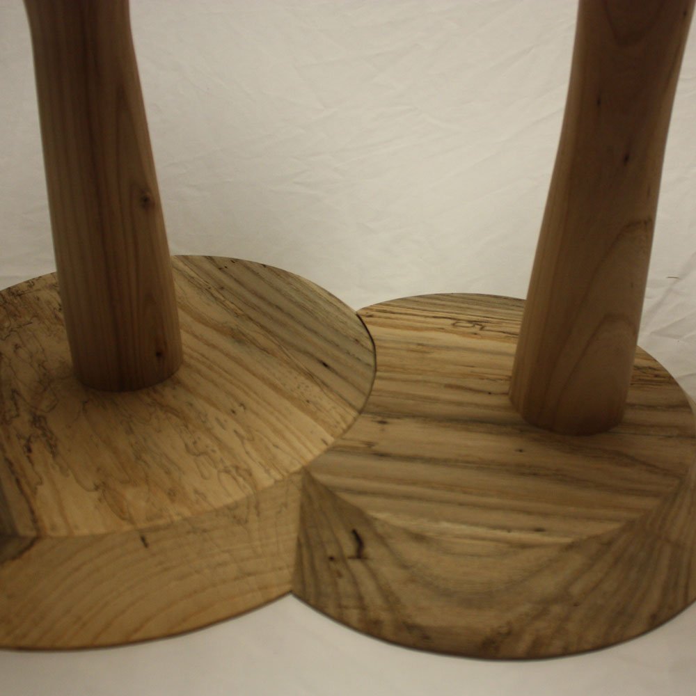 Close up of feet on nesting side tables