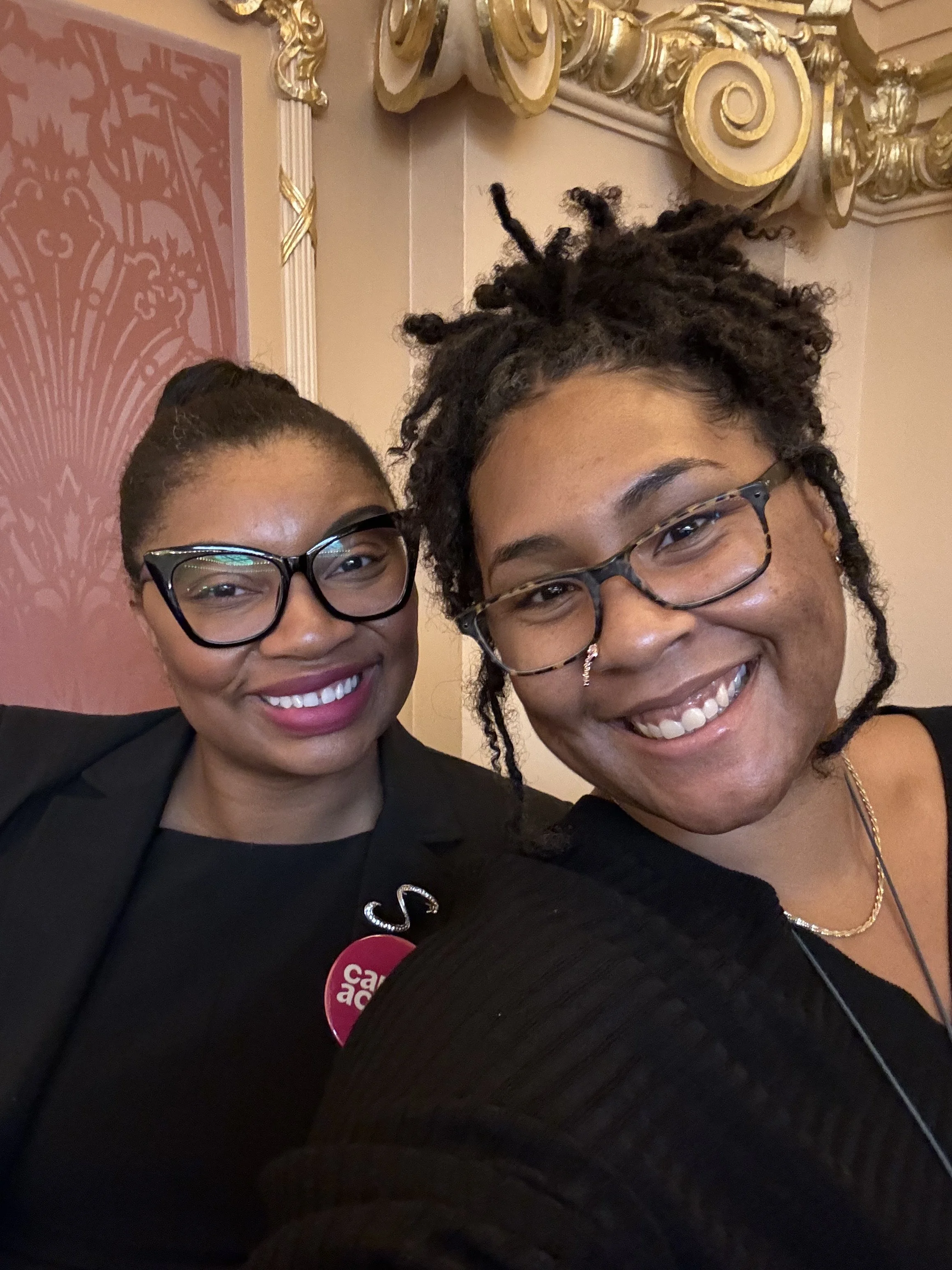 Sheri and Dejah at balcony in delegate chamber
