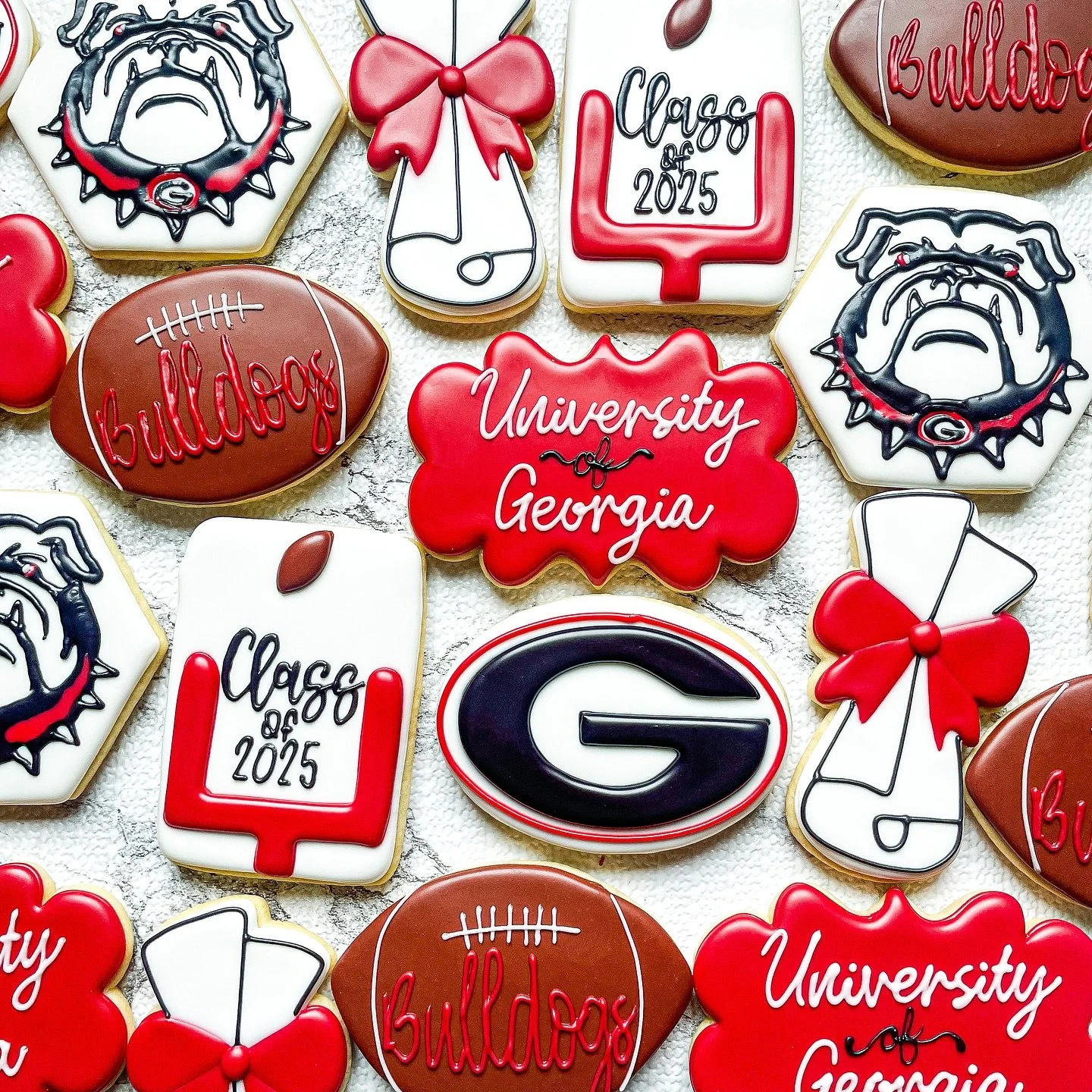 Next up for our 2025 grads, Go Dawgs! 🎓🅱️🐾
#cookiesbylyss #customcookies #cookieart #cookieartist #cookiecontent #decoratedcookies #glazecookies #cookies #cookiesofinstagram #cookiedecorating #graduationcookies #classof2025cookies #gradcookies #go