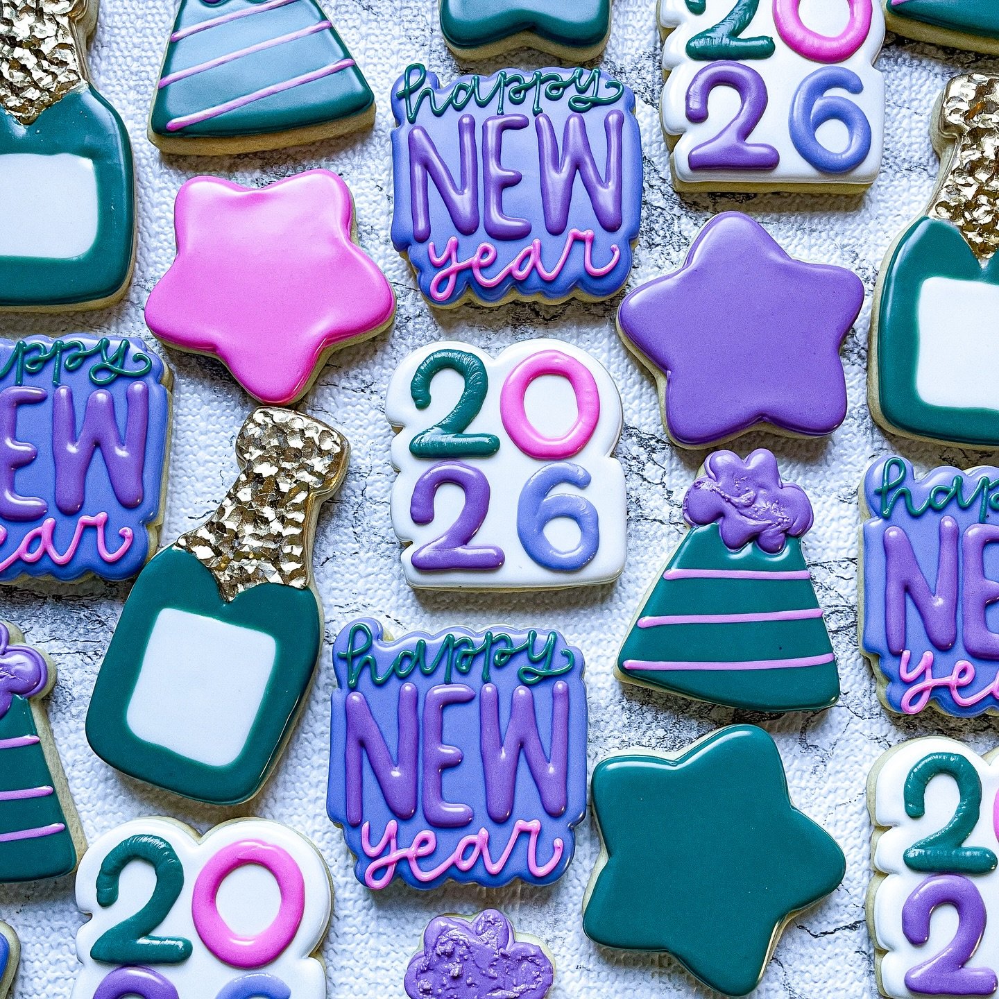 Happy New Year!! Let&rsquo;s get this bread! 🎉🎊

#cookiesbylyss #decoratedcookies #newyearscookies #2026cookies