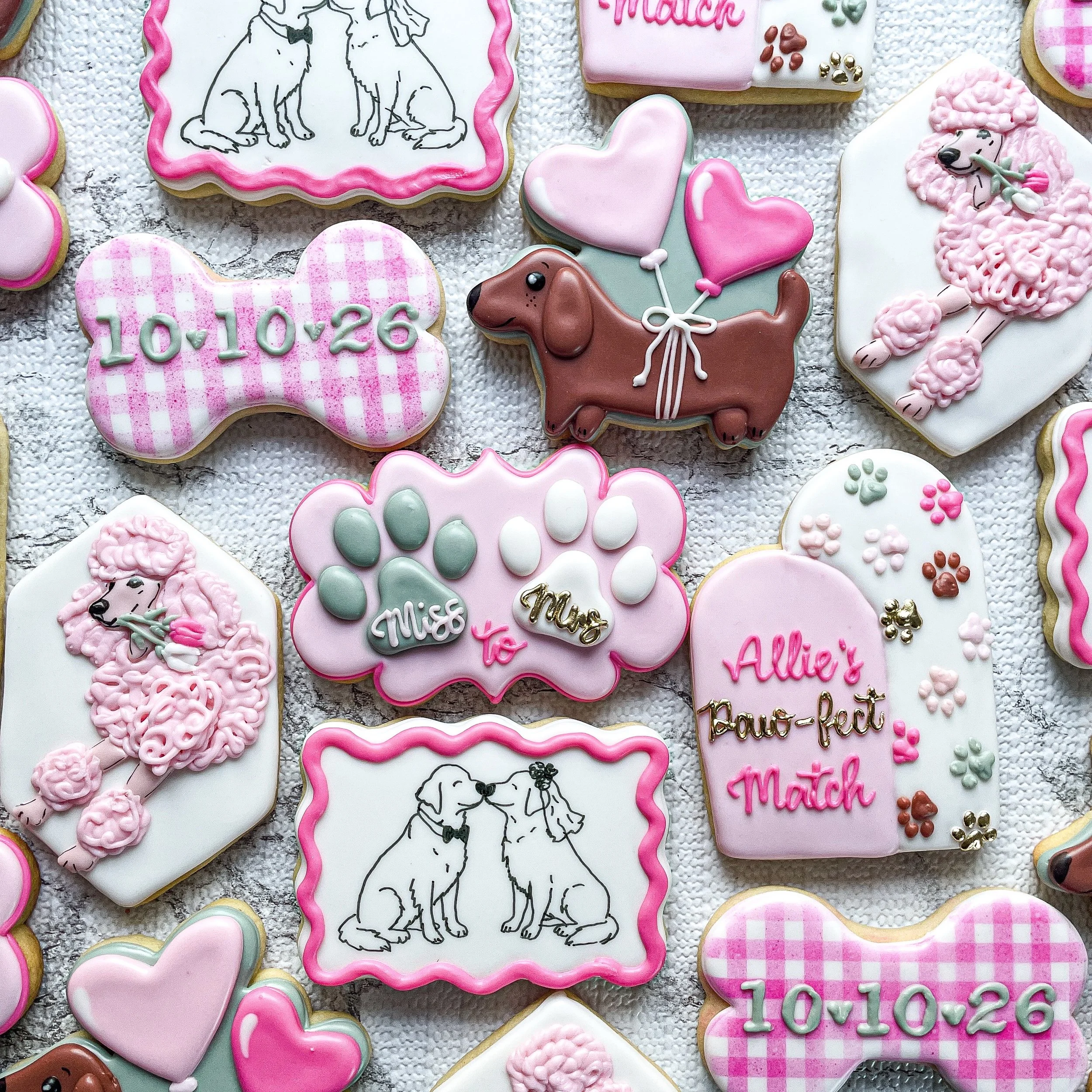 I seriously missed out on the best bridal shower theme I&rsquo;ve ever seen, thankfully I made cookies for it 🐶🐾💕When you have a shower at a place covered in dog pictures, it must be dog themed. 
#cookiesbylyss #bridalshowercookies #puppylovecooki