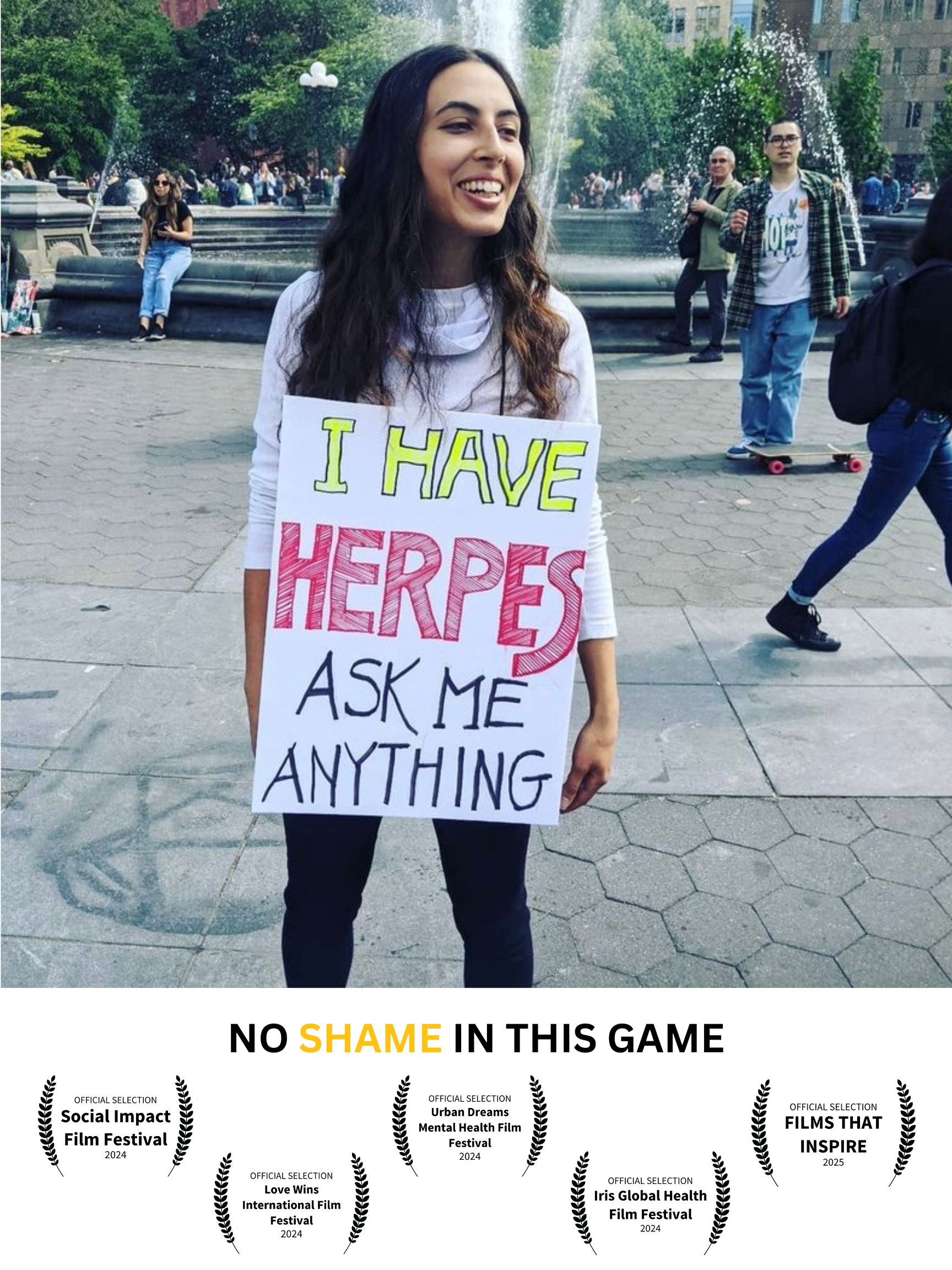 A woman holding a sign that reads, "I HAVE HERPES ASK ME ANYTHING," standing in a park with a fountain and other people in the background.