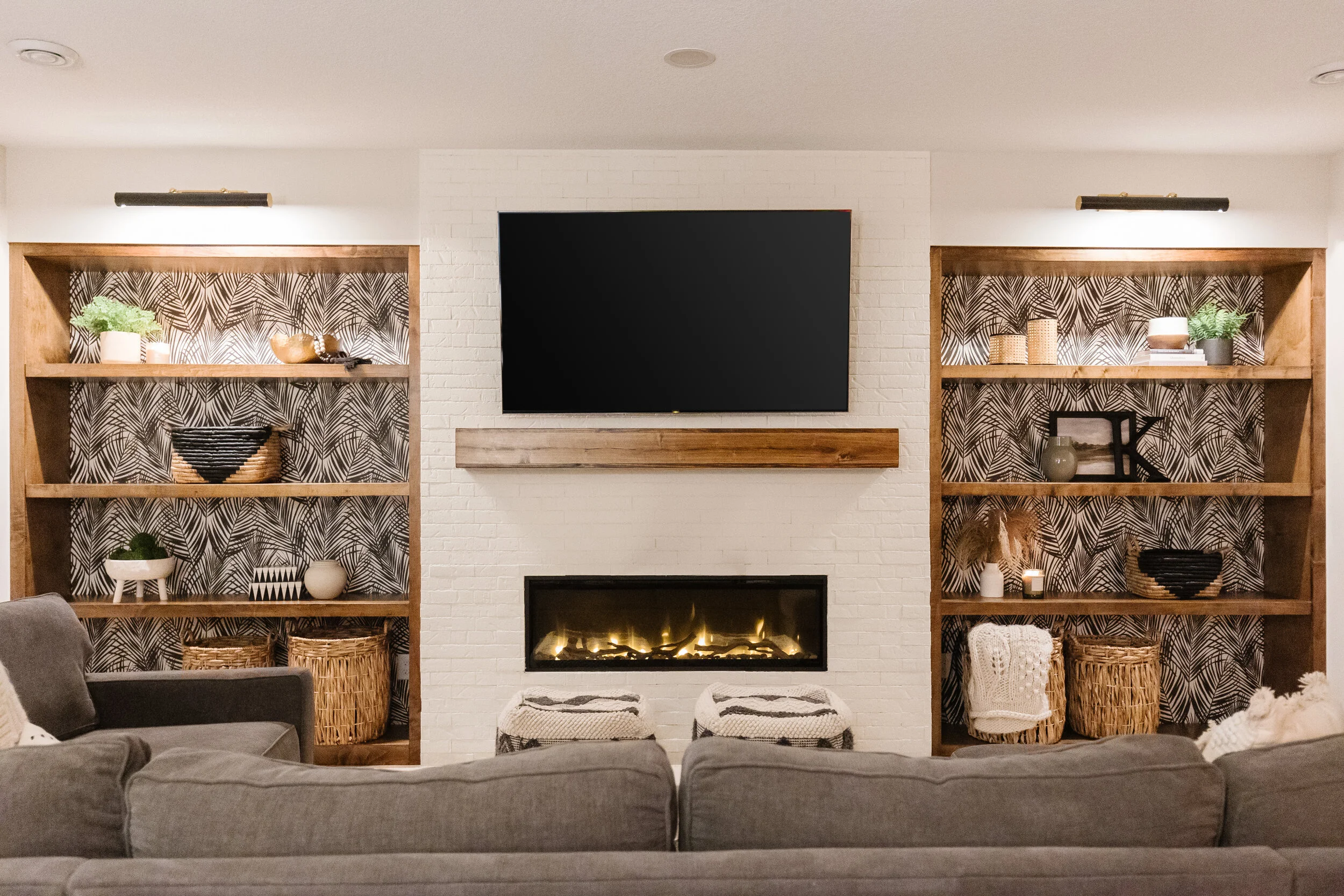 closeup of white brick fireplace and builtins