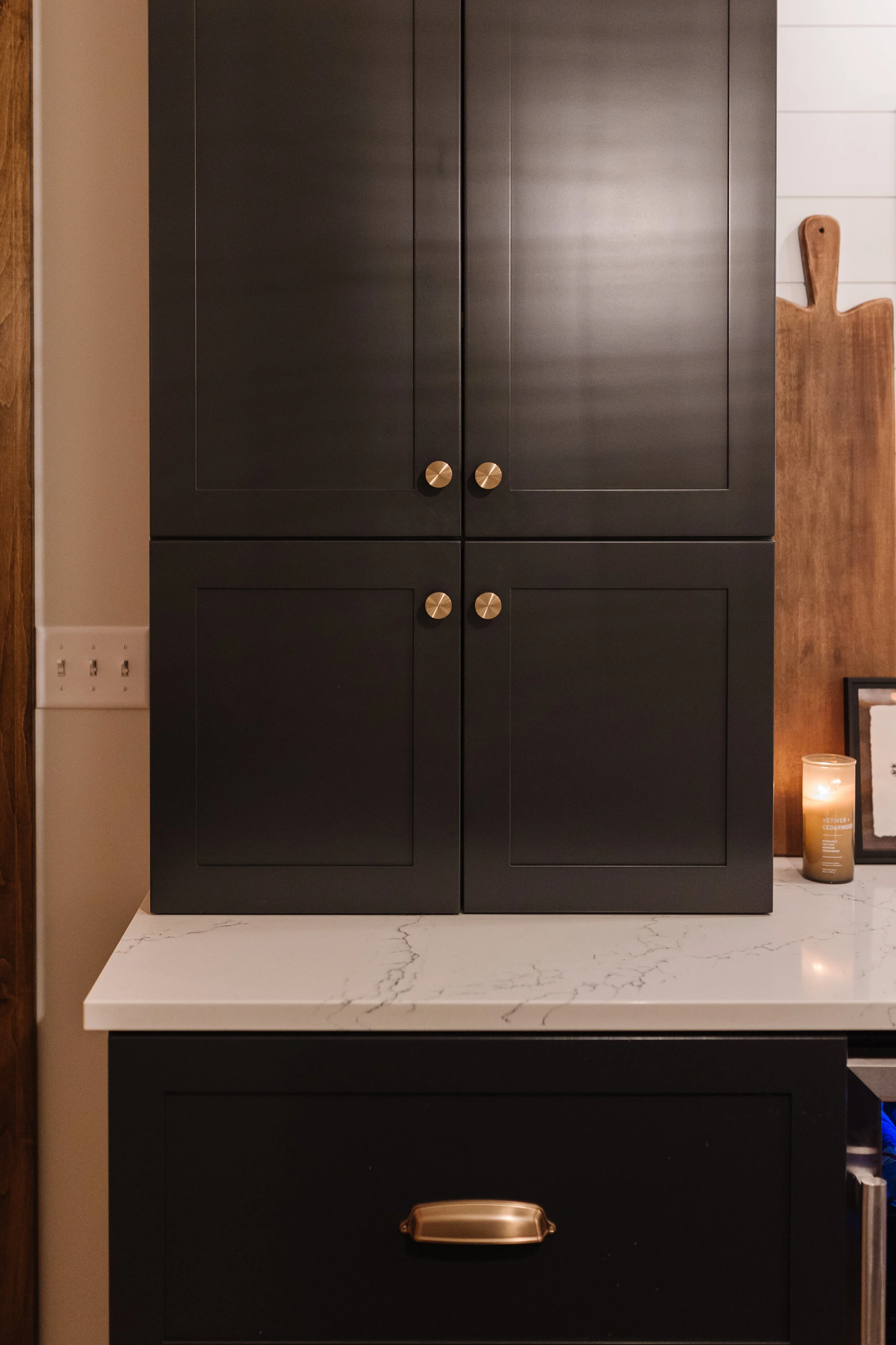 closeup of black bar cabinetry