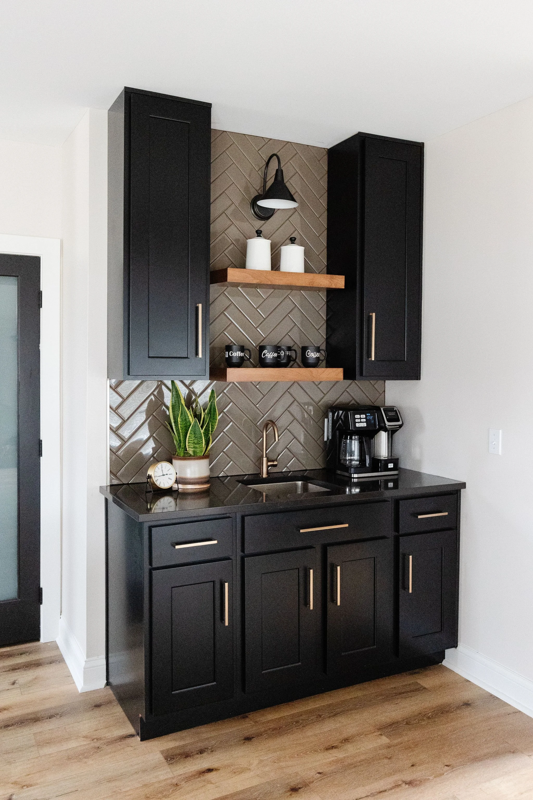 black cabinets coffee bar