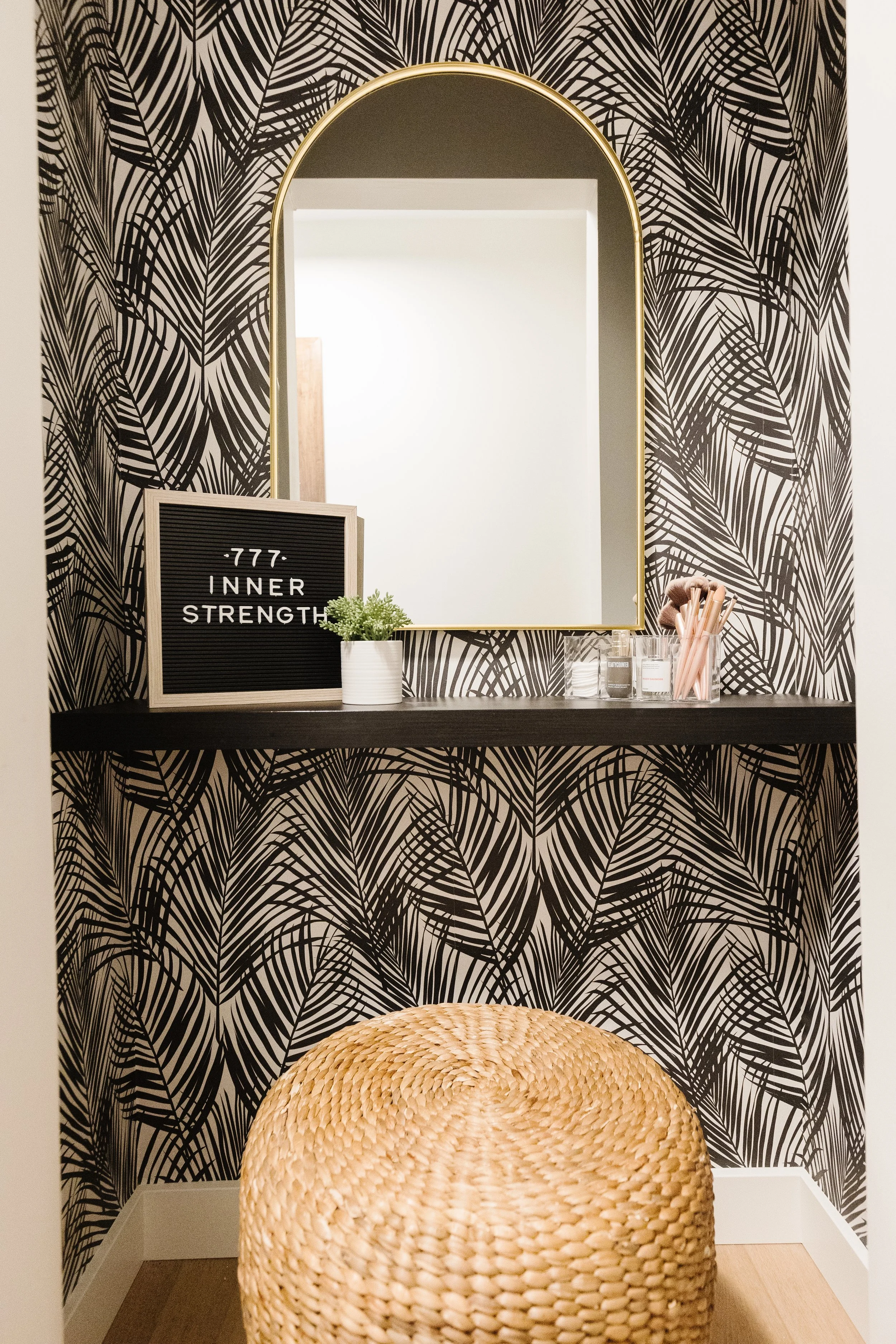 black and white wallpapered nook