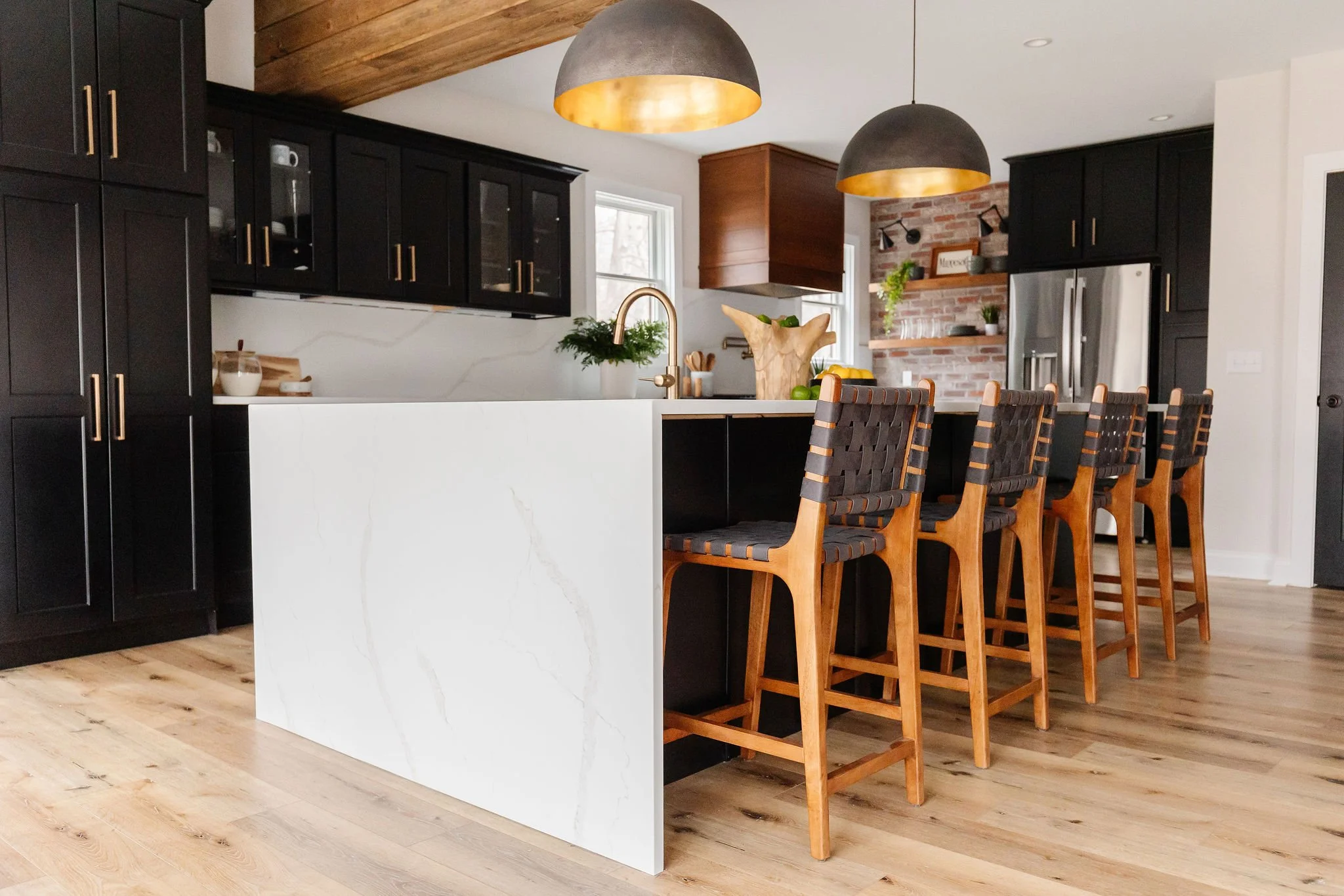 white stone waterfall kitchen island