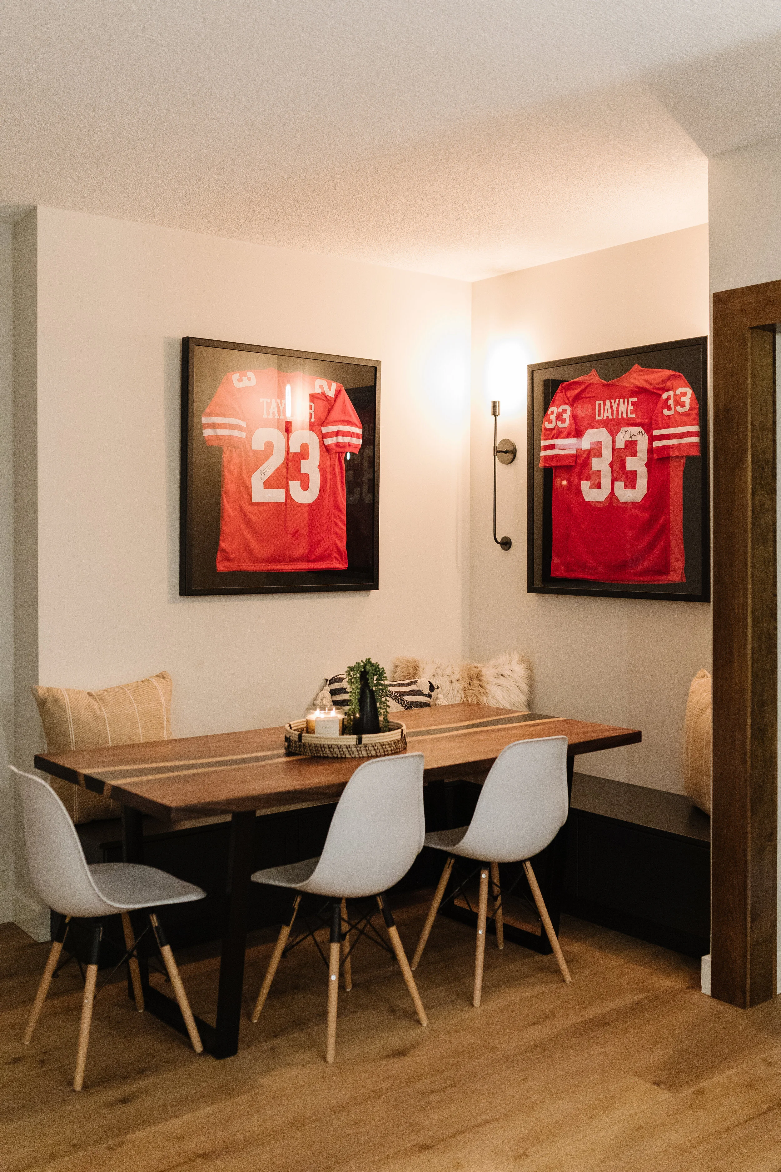 Side view of basement dining area with built in bench