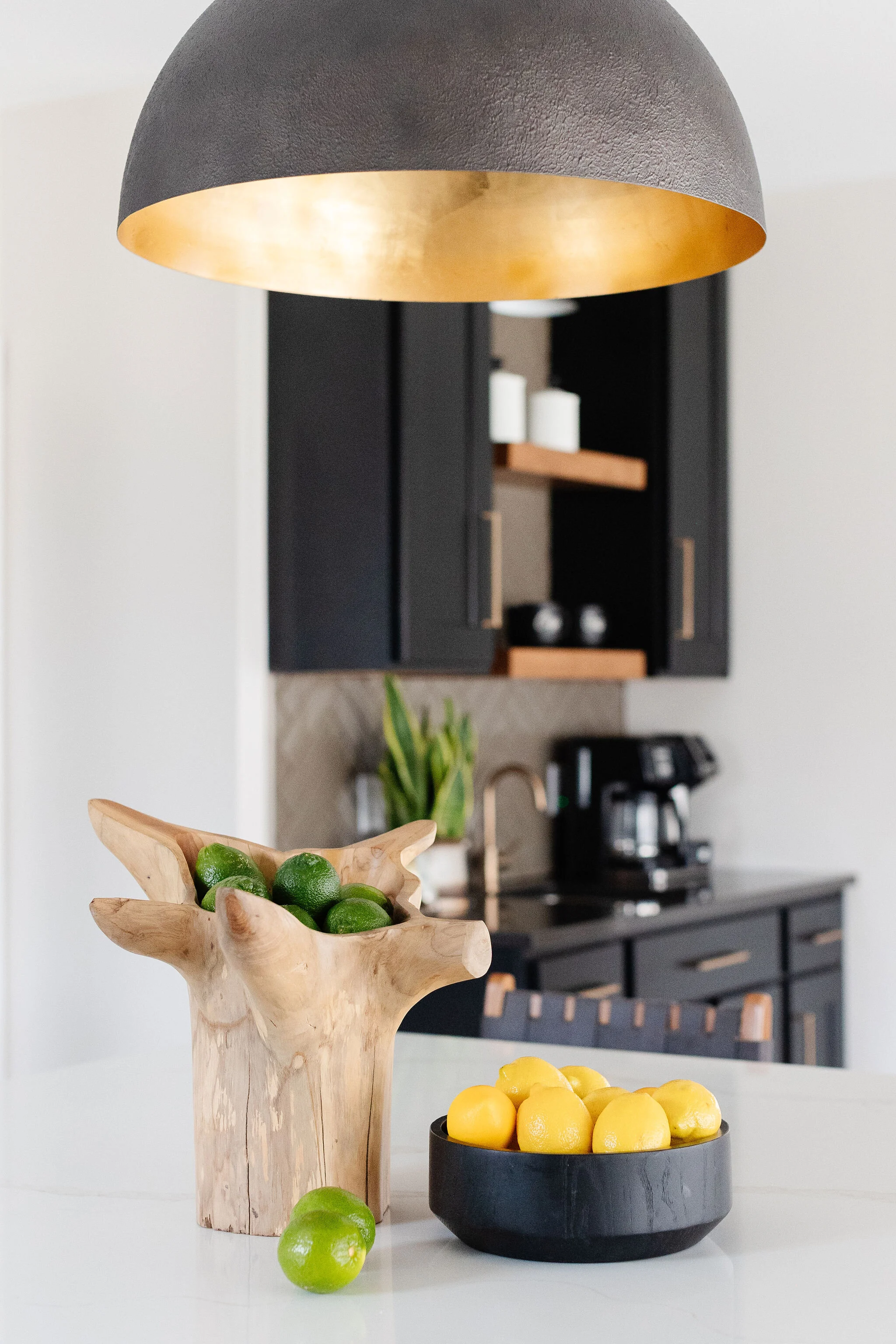 styling on island with pendant light above
