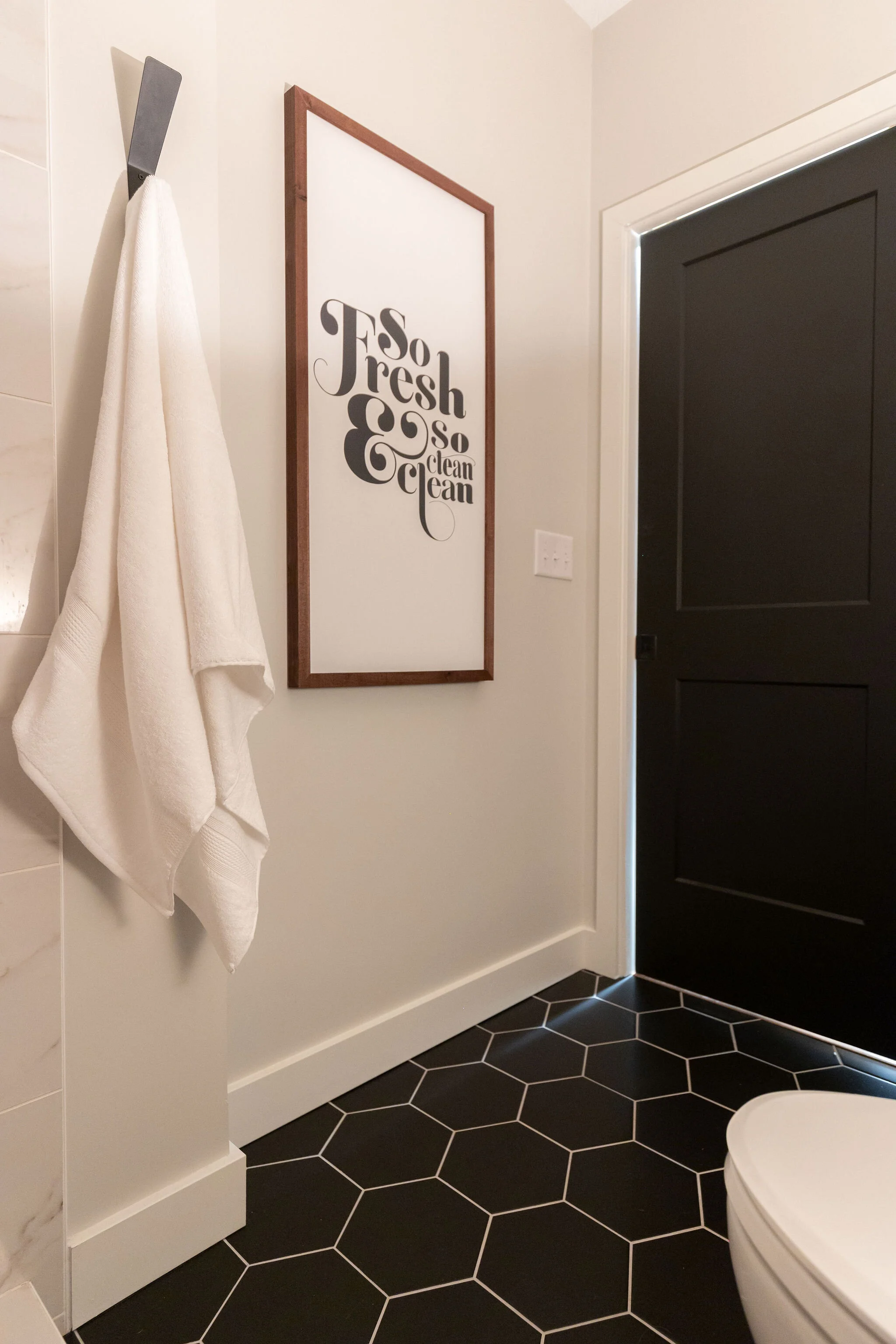 bathroom wall with art