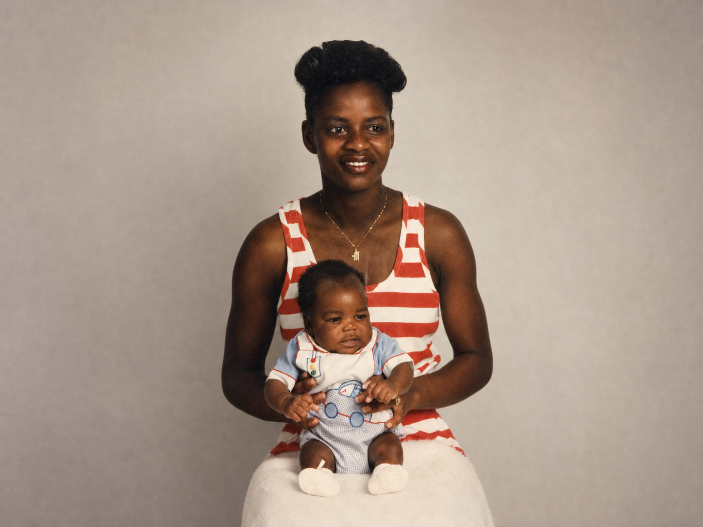 Melissa D. White-Coleman holding her son, Dwayne, as a baby.
