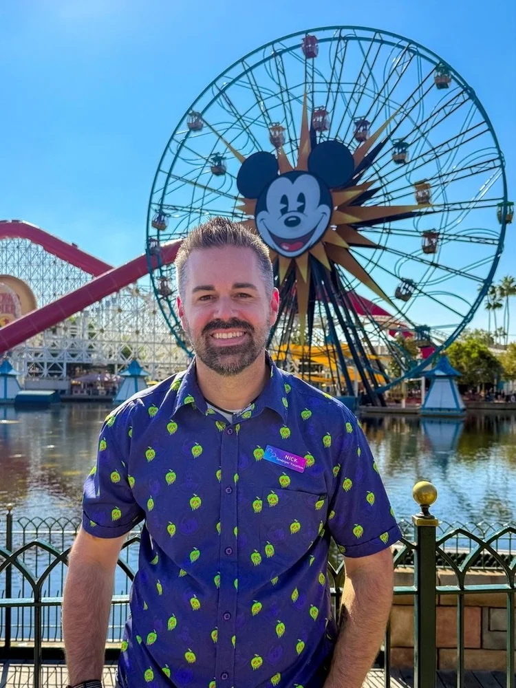 Nick Bryan, Founder and CEO of Sandpiper Vacations, in front of the Pixar Pal-A-Round wheel at Disney California Adventure