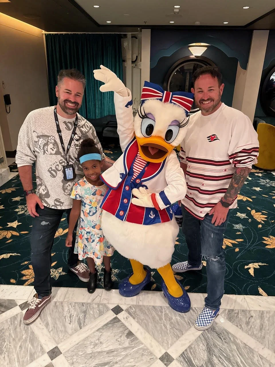 Nick and Sean Bryan with their daughter Piper and Daisy Duck