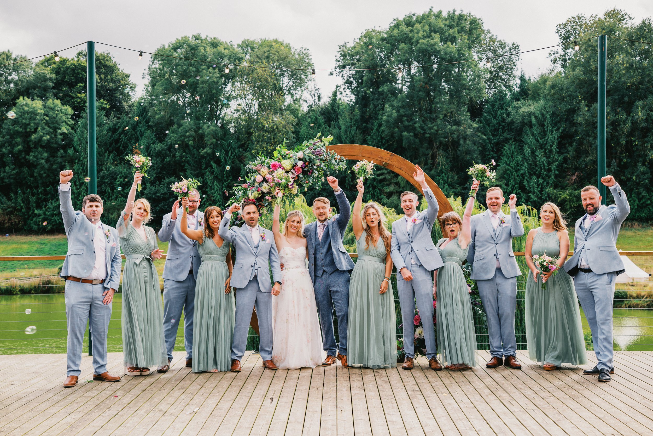 Wedding party of bridesmaids and groomsmen at Hadsham Farm