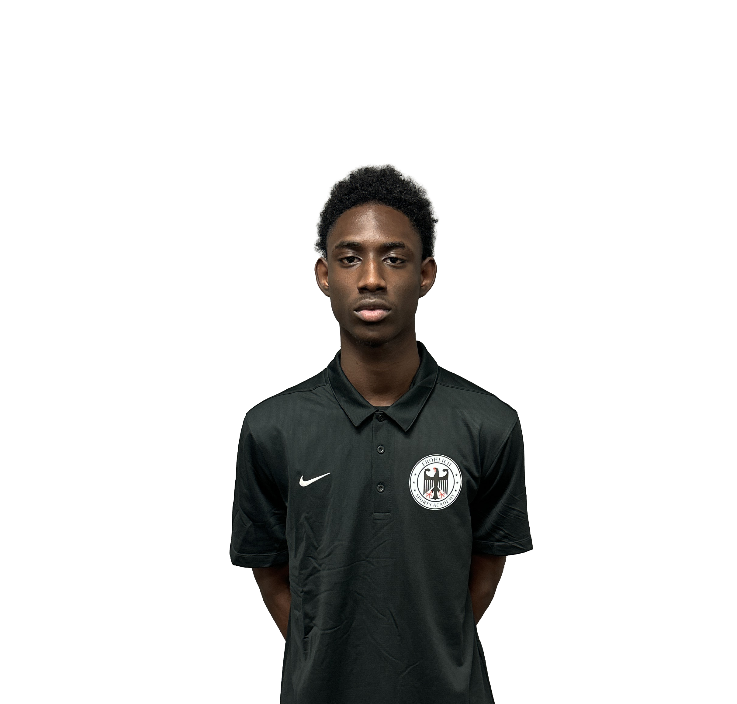 Young boy smiling, wearing a black t-shirt and red sports jersey with 'FROHLICK' written on it.